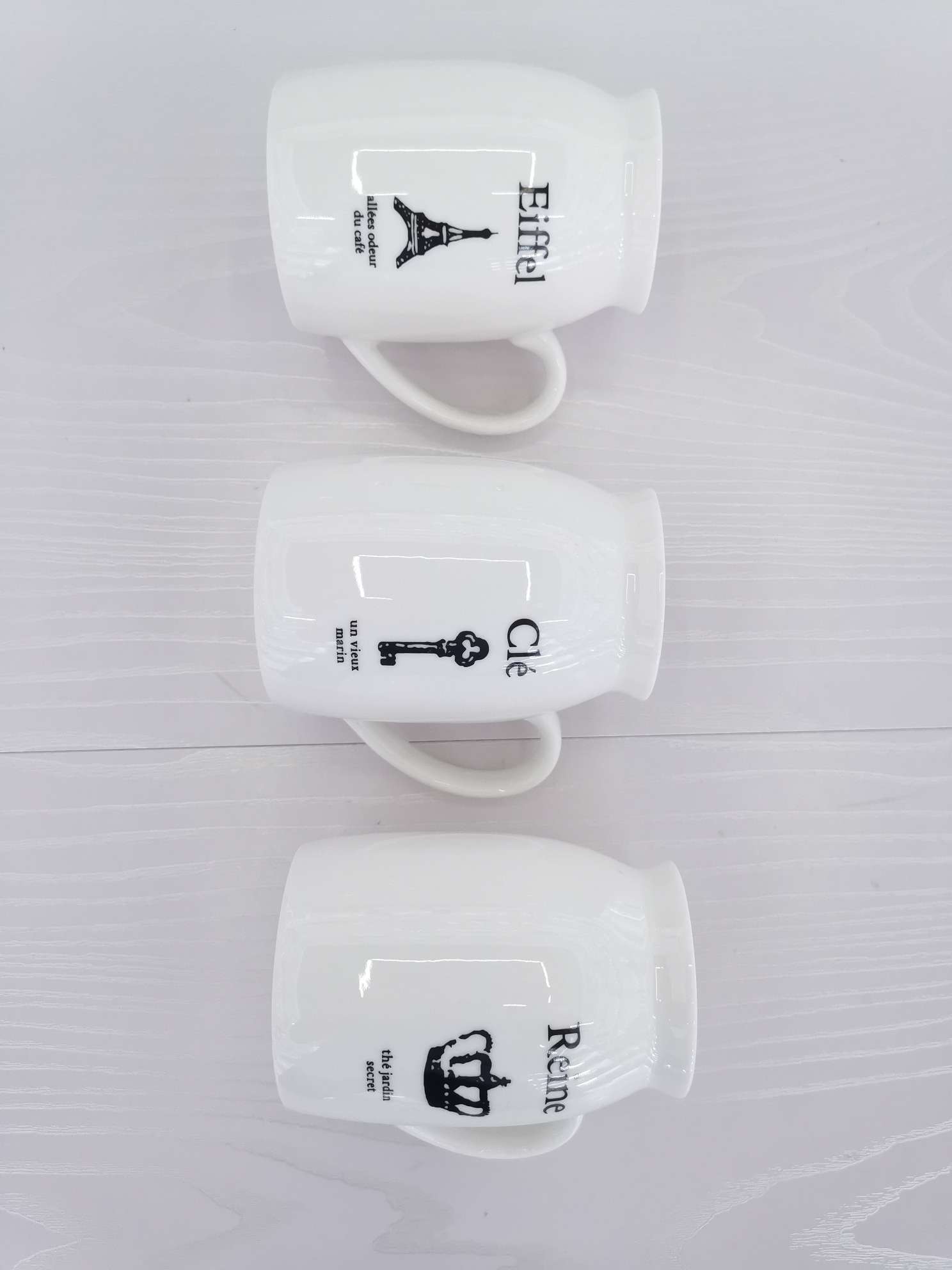 Simple white glossy ceramic milk cups and water cups undefined