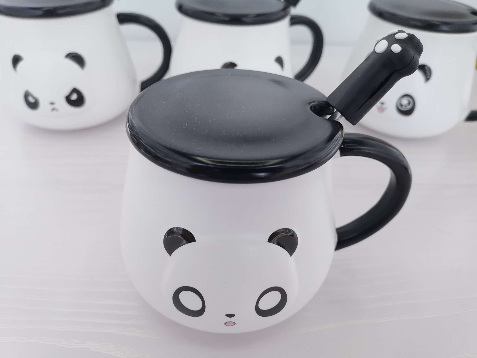 Three-dimensional panda-shaped ceramic cups, coffee cups and water cups undefined