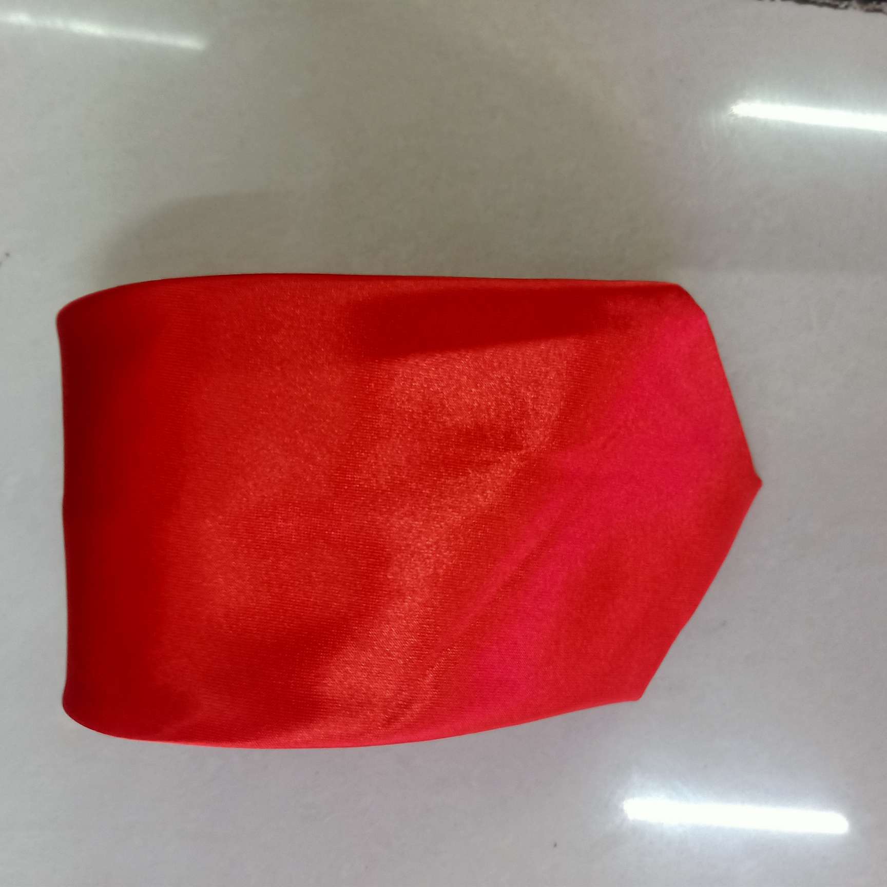 The 8-centimeter-long band is bright red