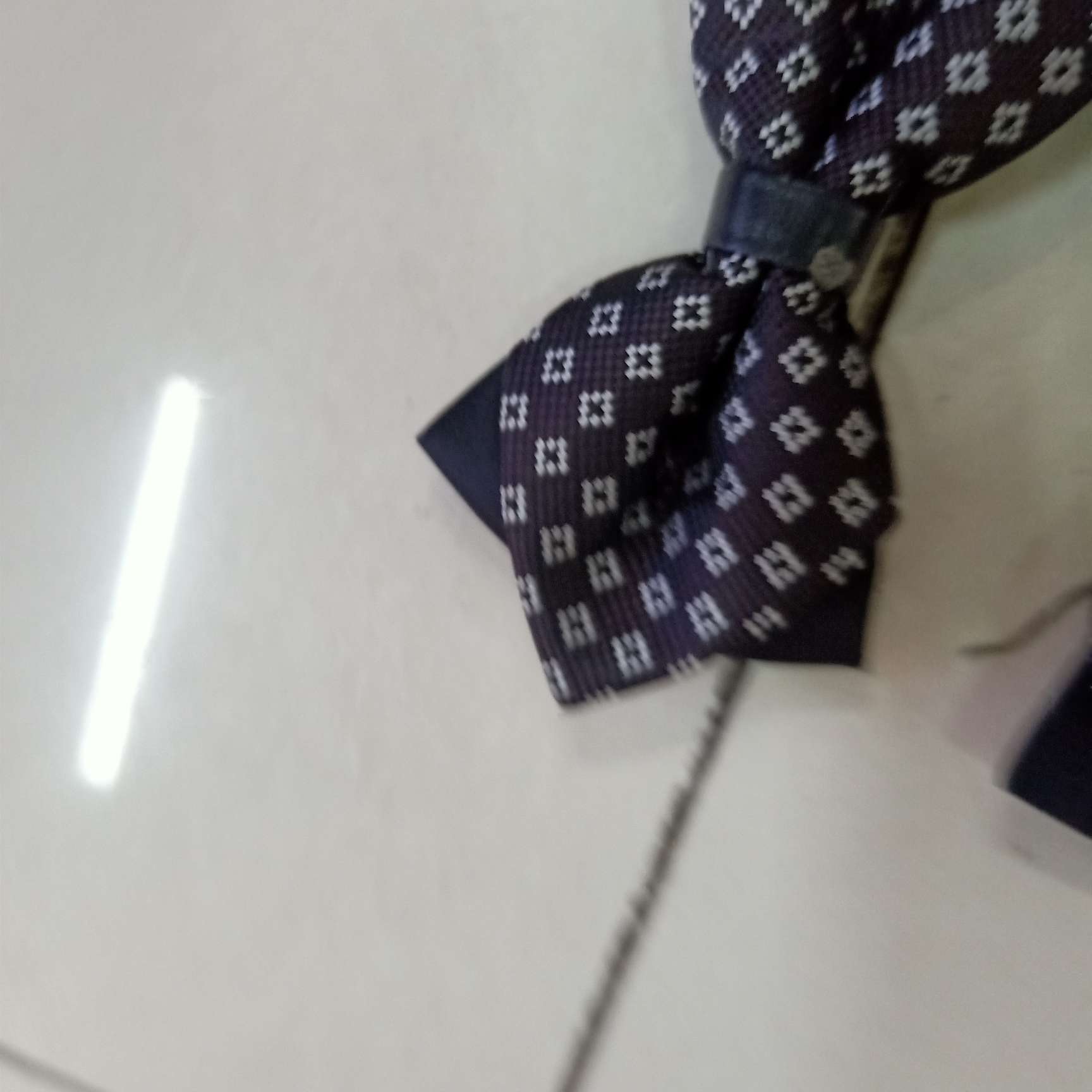 皮包蕊尖角领结细节图