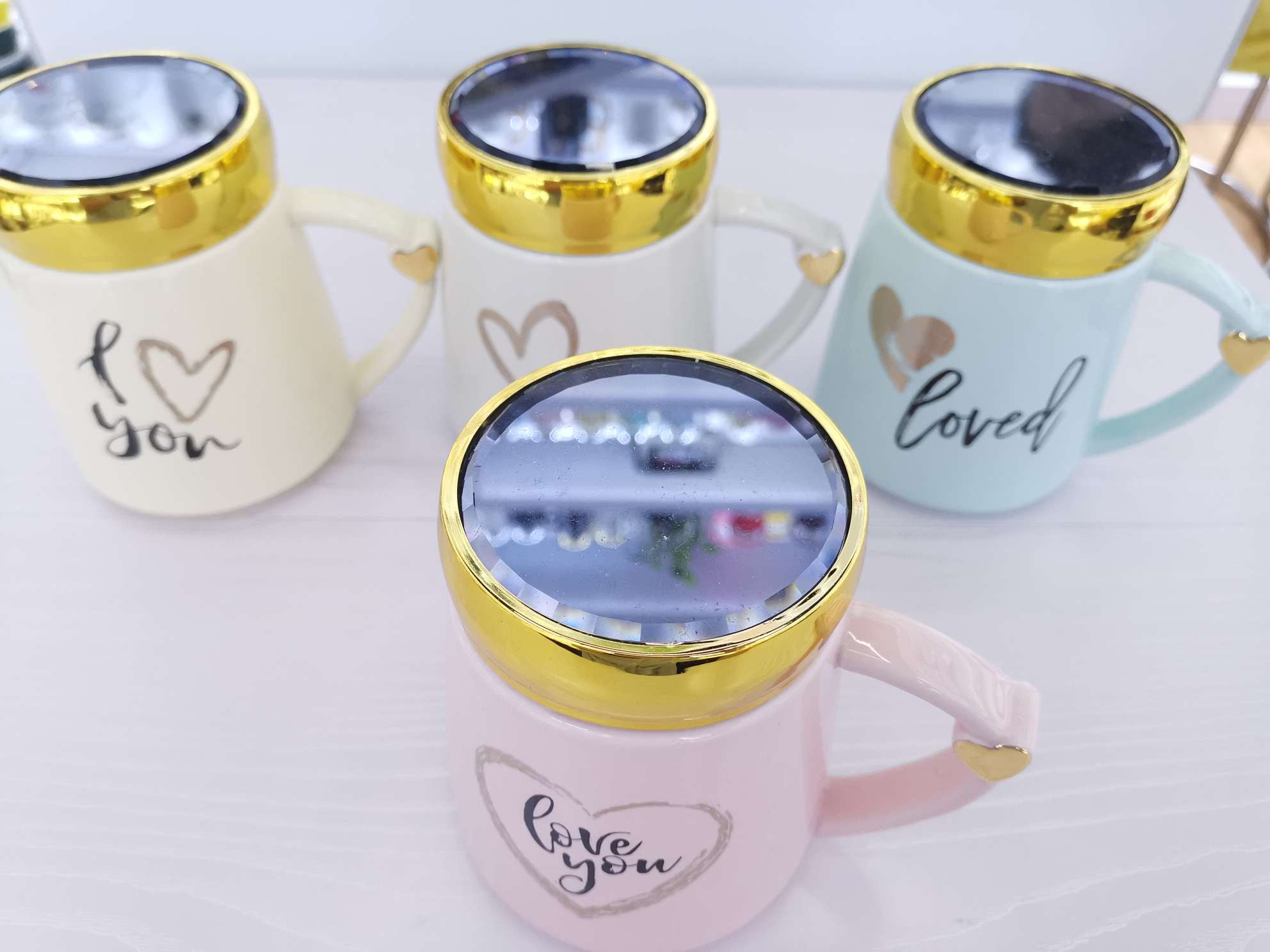Heart-shaped handle colored glazed ceramic mirror cup, coffee cup, water cup details Picture
