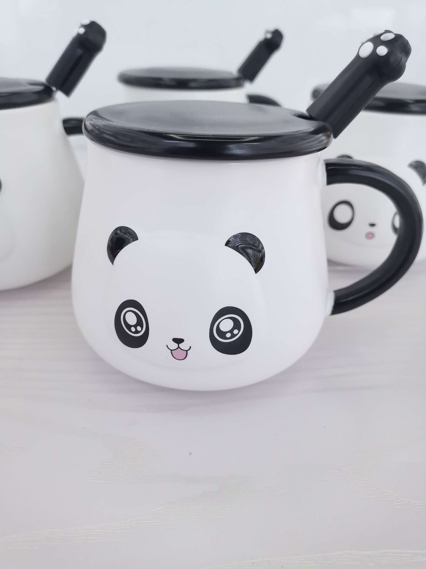 Three-dimensional panda-shaped ceramic cups, coffee cups and water cups undefined