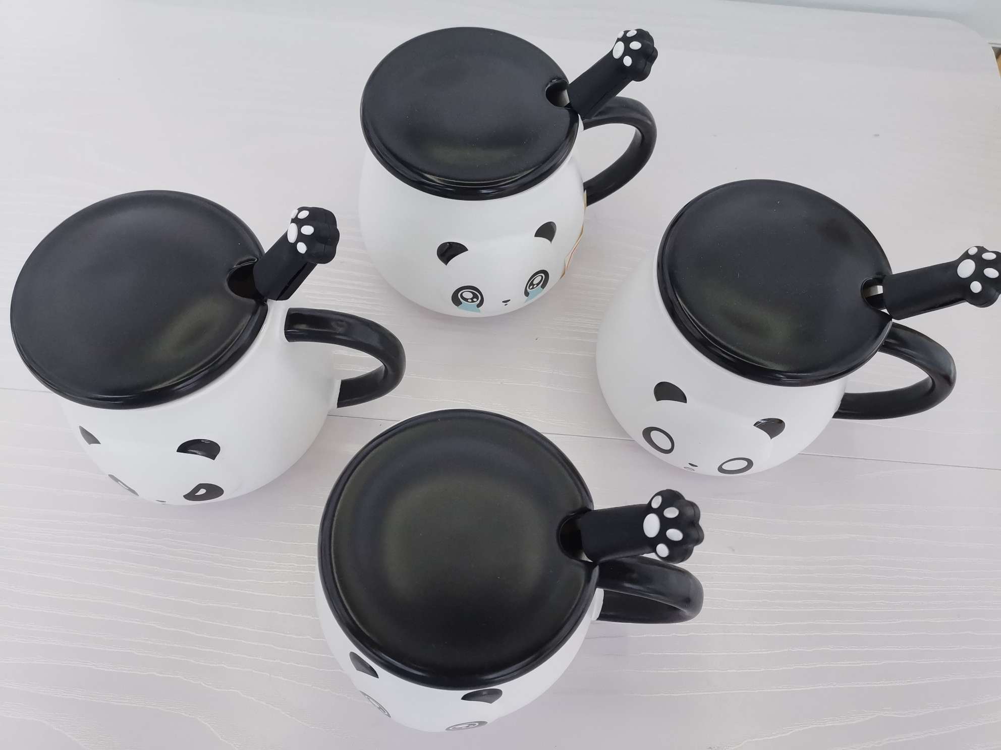 Three-dimensional panda-shaped ceramic cups, coffee cups and water cups undefined