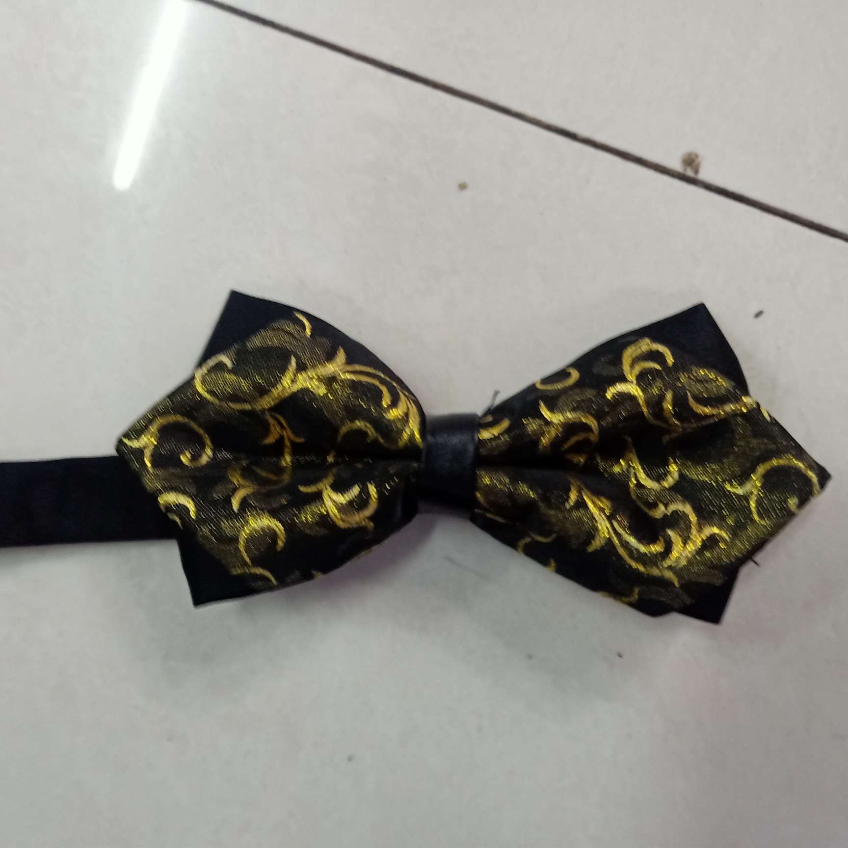 皮包蕊尖角领结产品图