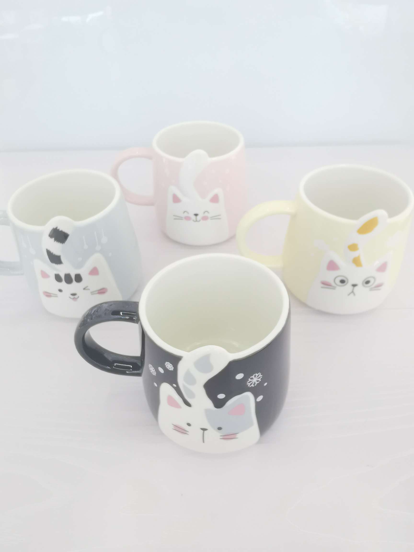 Cute cat-shaped colored glazed ceramic cups, coffee cups and water cups