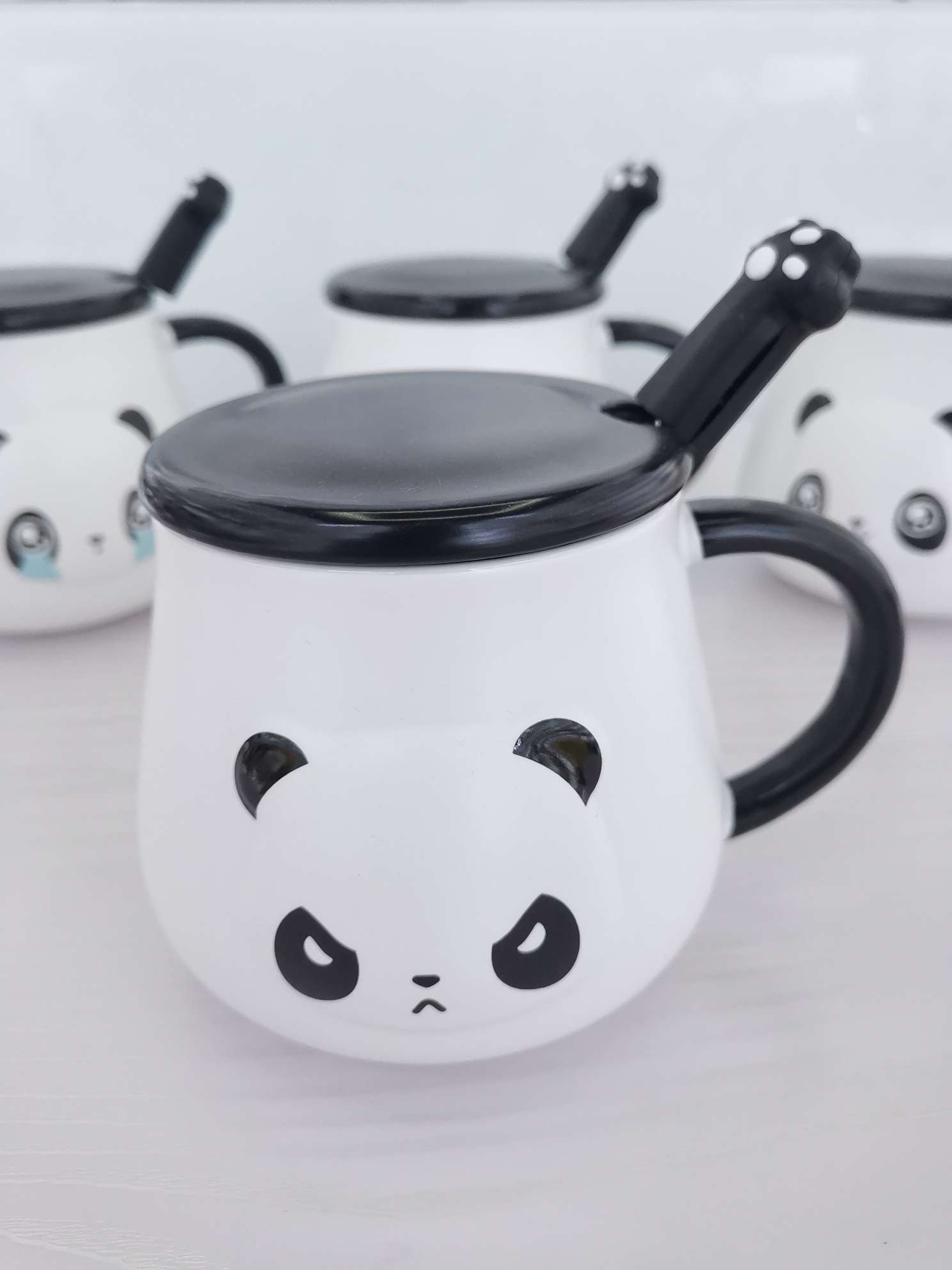 Three-dimensional panda-shaped ceramic cups, coffee cups and water cups Item Picture