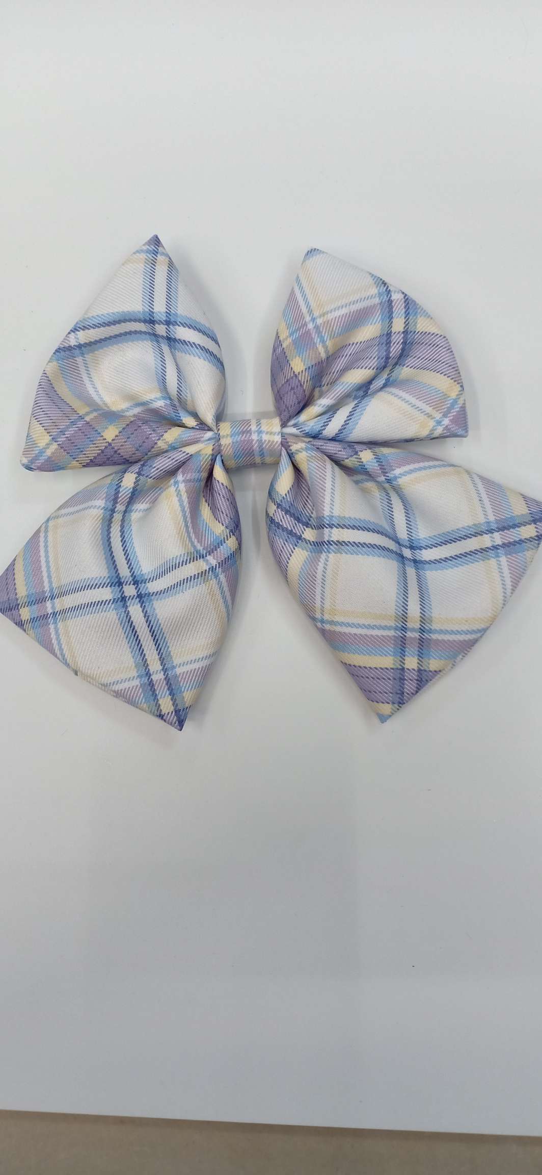 The checkered headdress is purple and blue details Picture