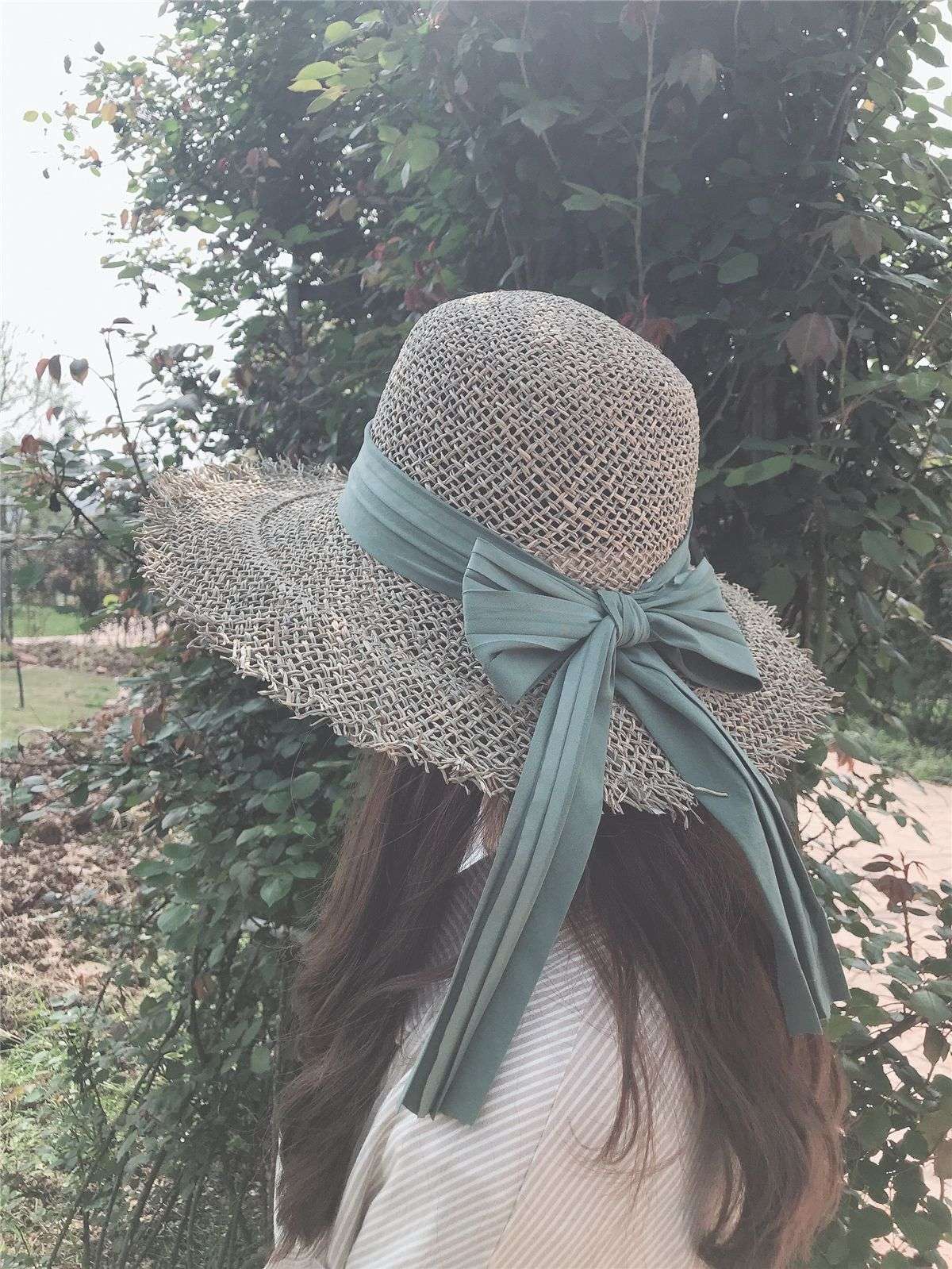 草帽女春夏咸草大沿蝴蝶结出游度假帽子女毛边镂空防晒遮阳渔夫帽