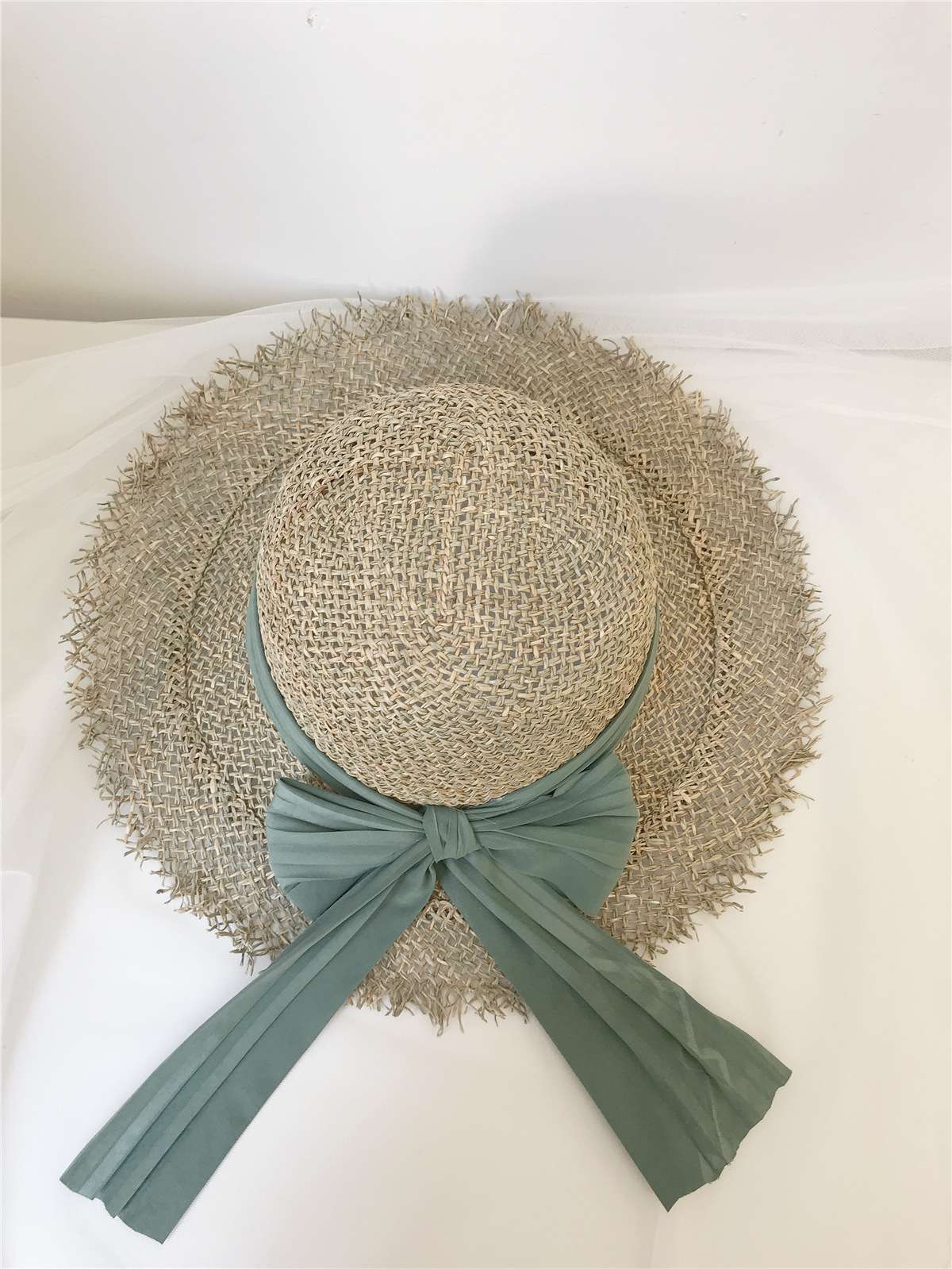 草帽女春夏咸草大沿蝴蝶结出游度假帽子女毛边镂空防晒遮阳渔夫帽细节图