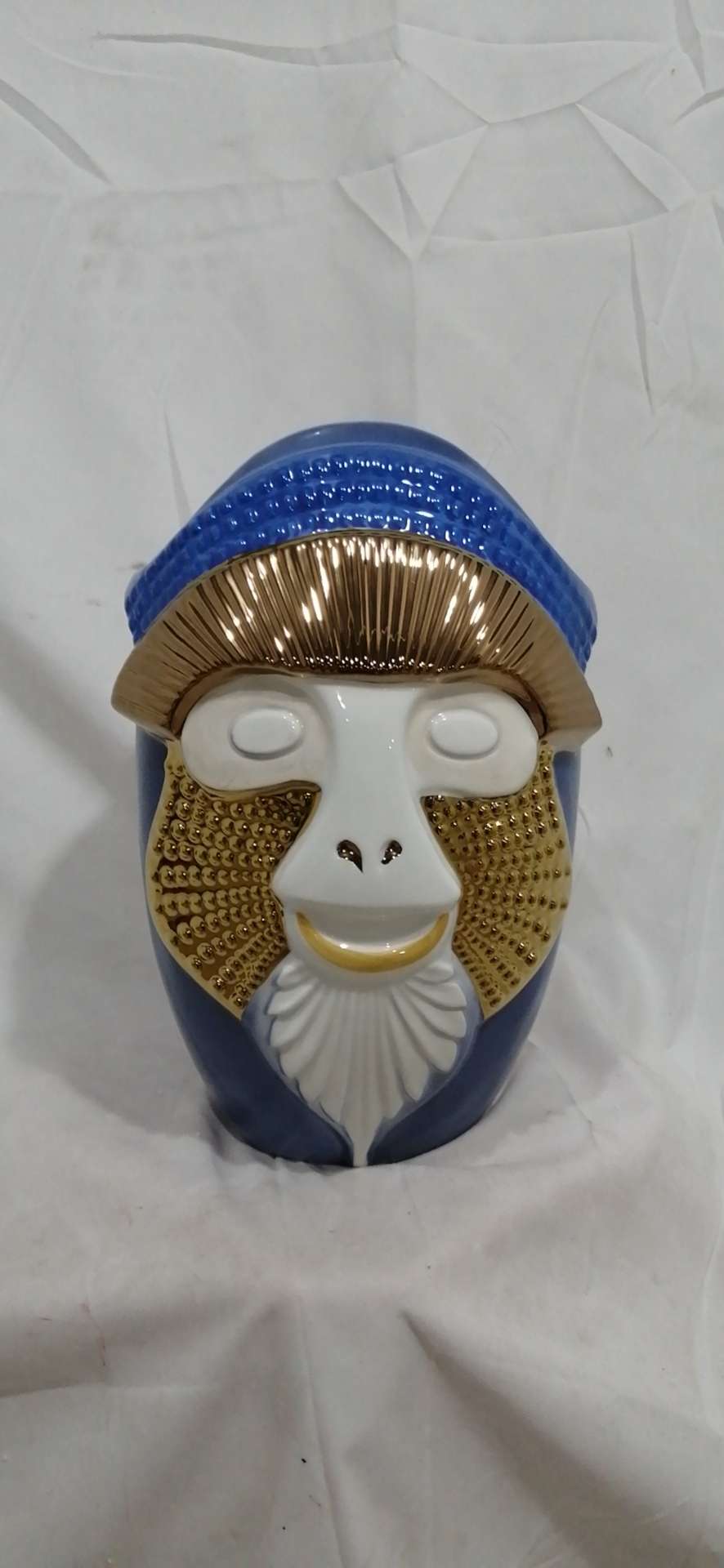 The ceramic monkey-face bottle is 35 cm tall details Picture