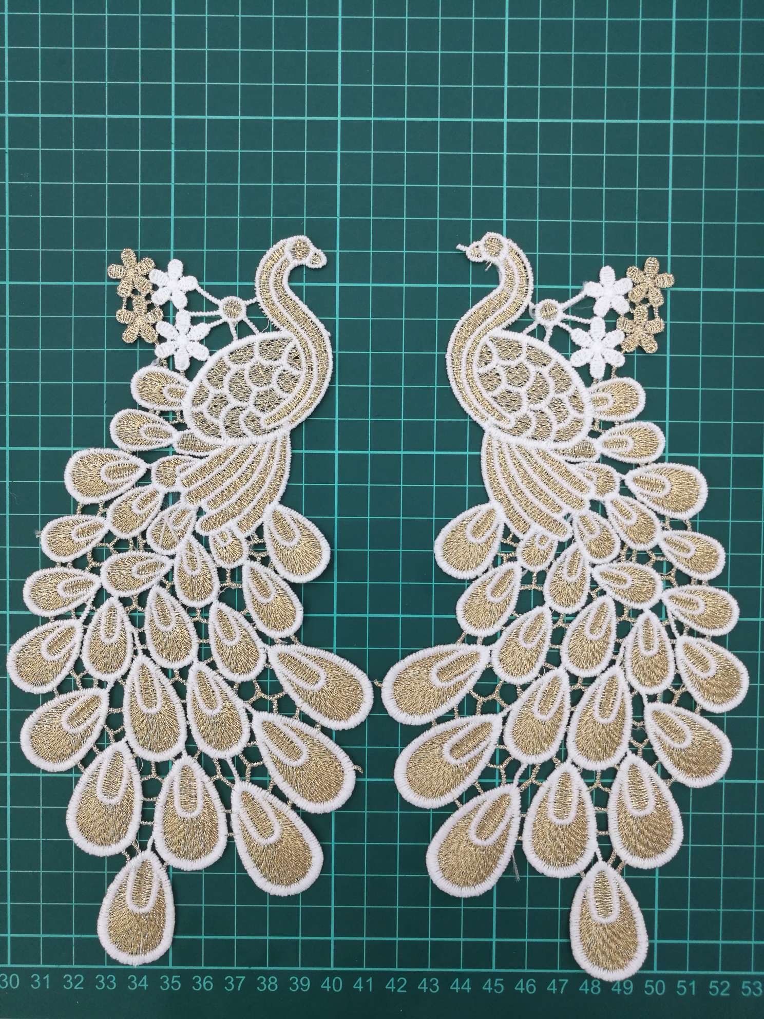 Water-soluble white with golden flower edges, peacock