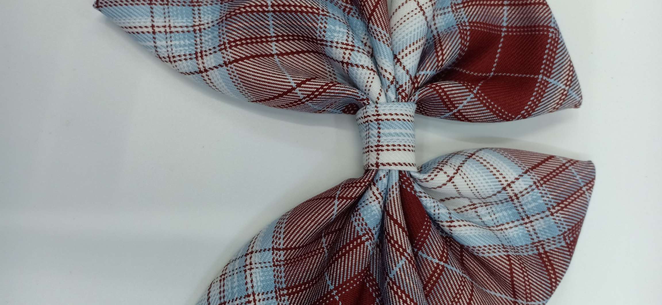 The checkered headdress is in coffee color details Picture