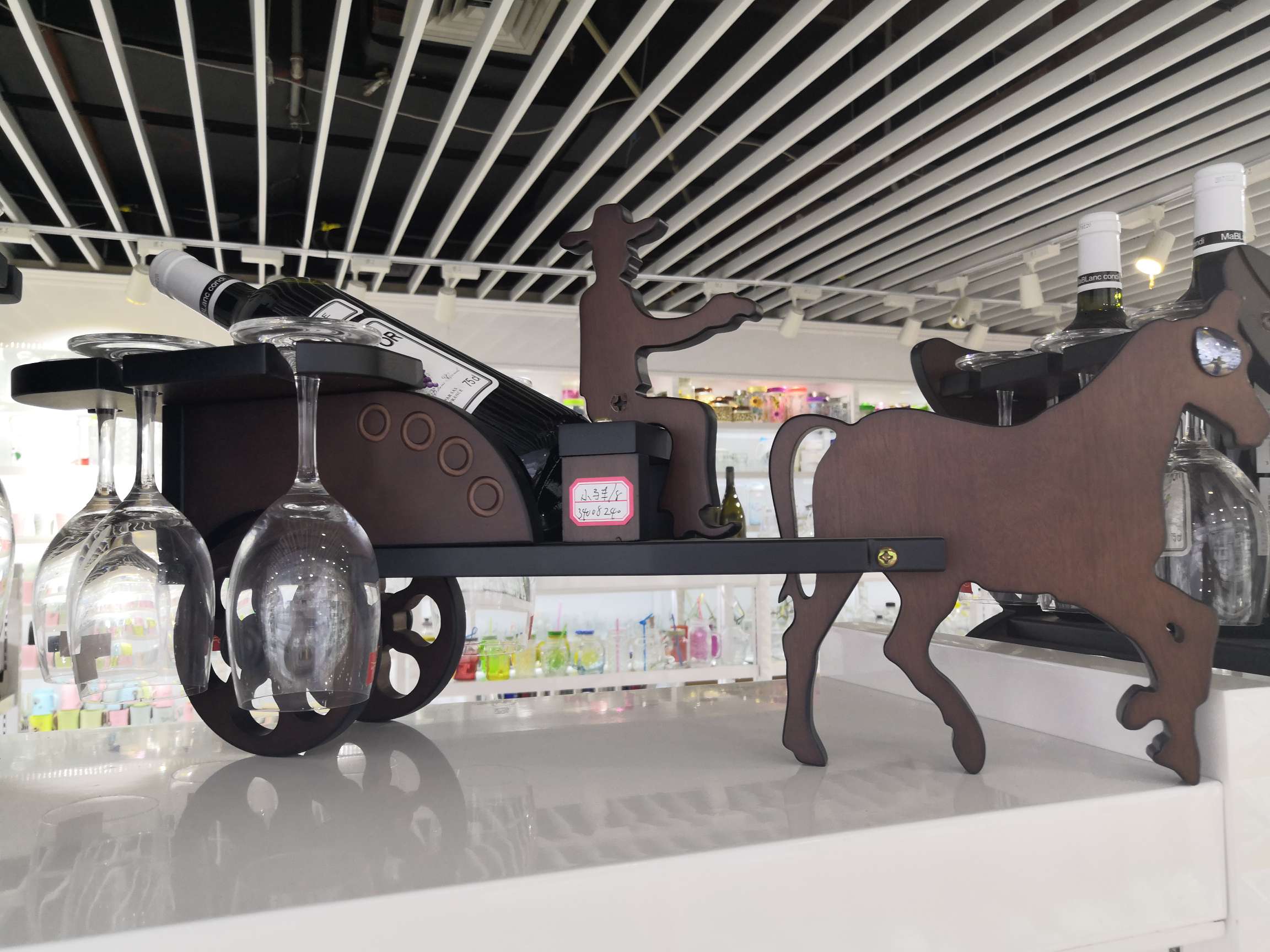 A small carriage wine rack