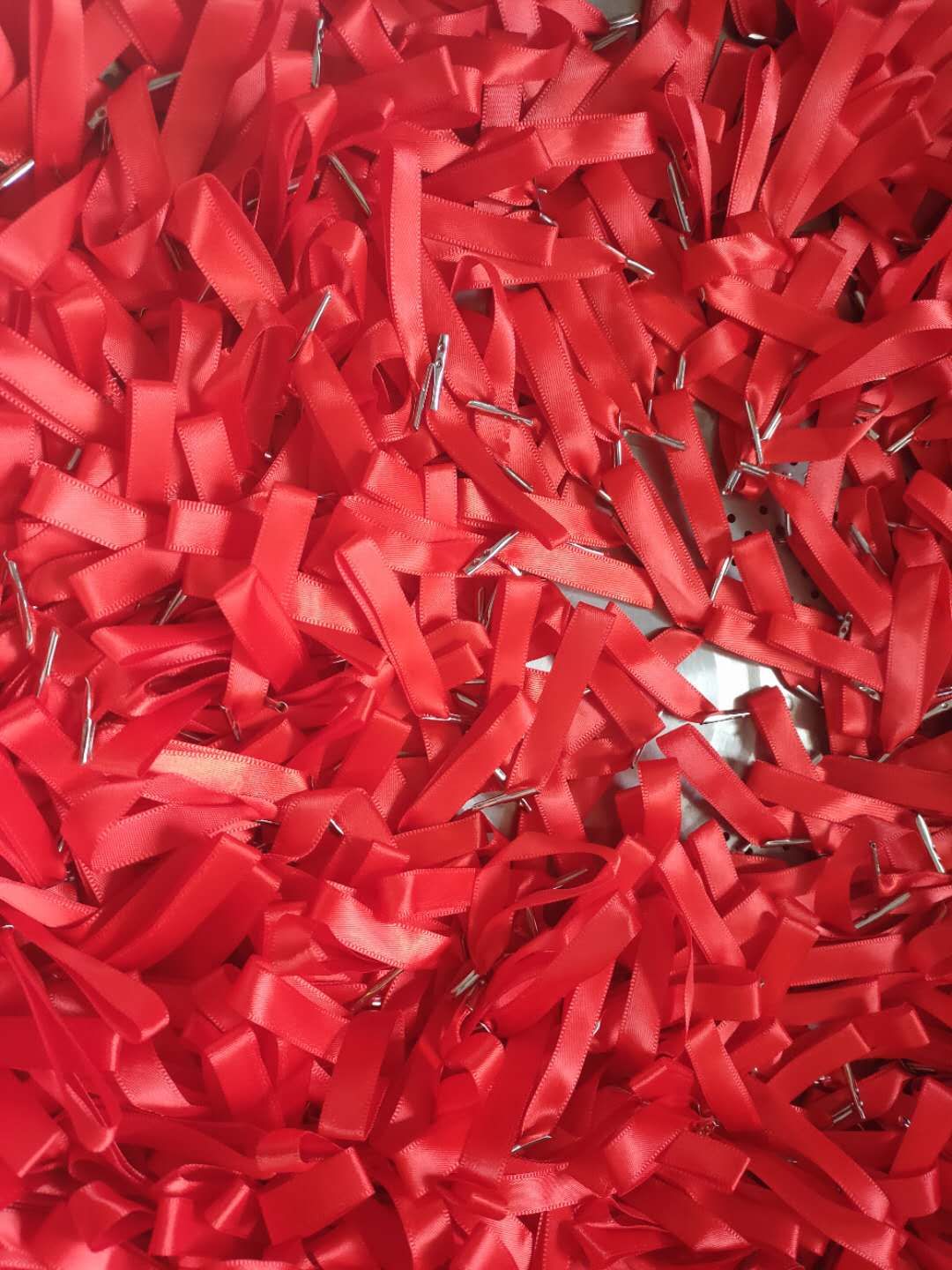 Red ribbon with one end of the anchor rope thumbnail