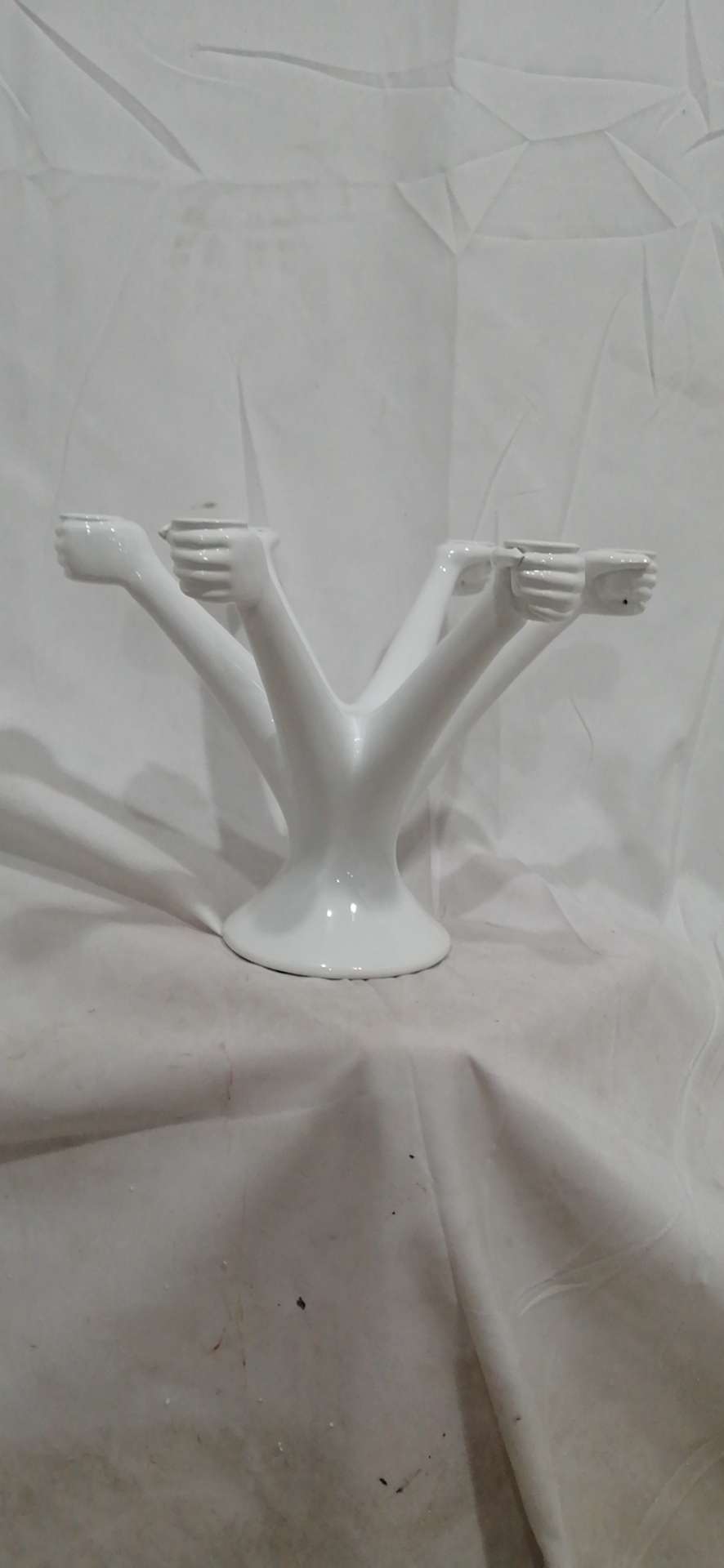 Creative design of home handicrafts and decorative items for the entrance hall. Ceramic white candlestick, 23.6*34