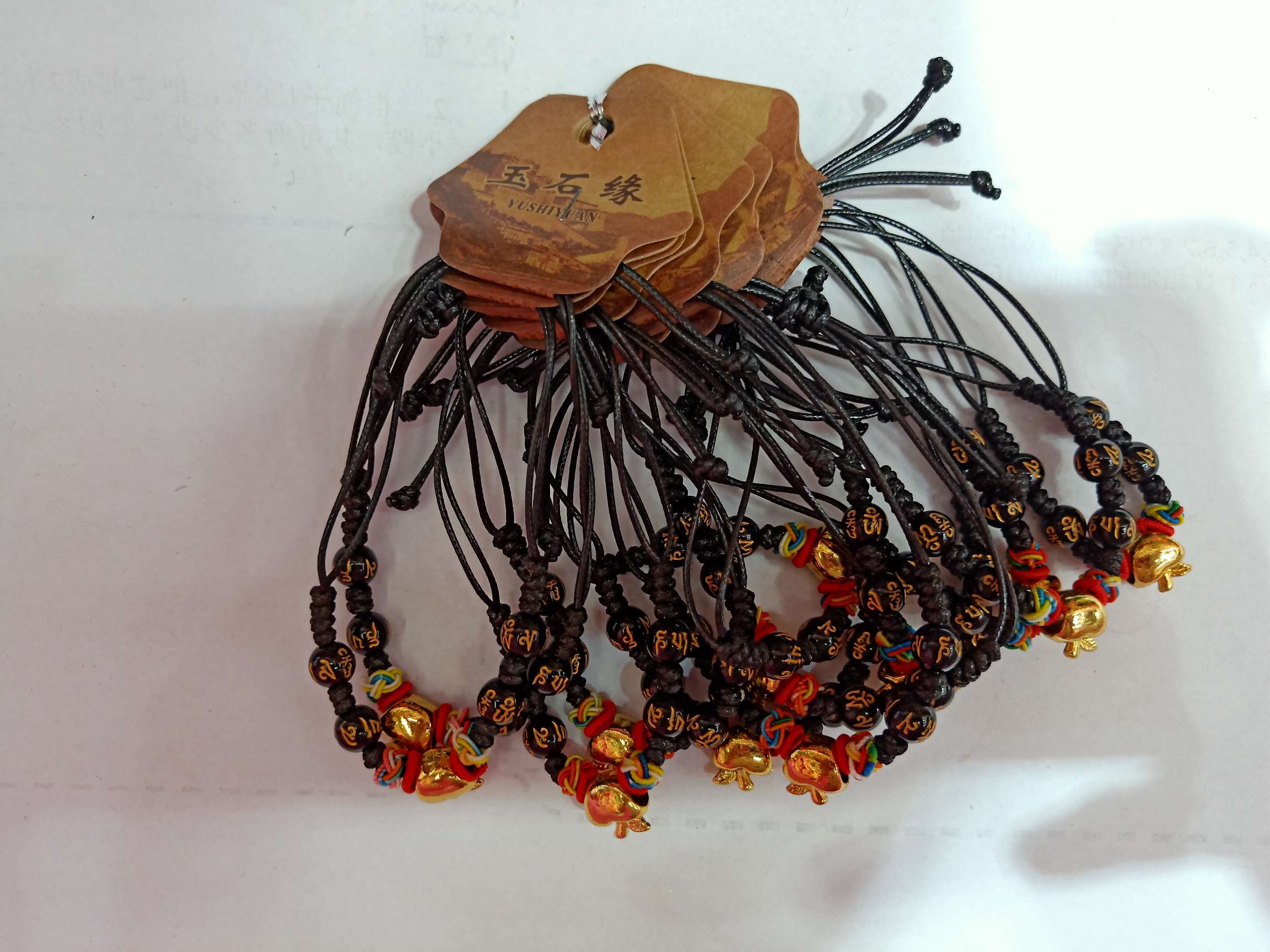 Black rope gold apple hand - woven bracelet thumbnail