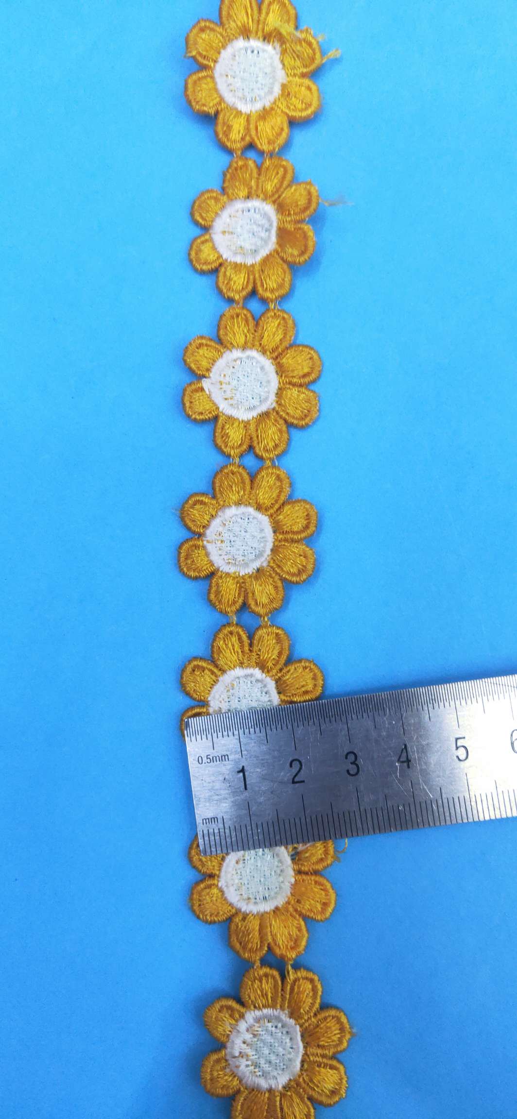 Factory direct sales of 2019 best-selling embroidered chrysanthemum children's clothing accessories in stock