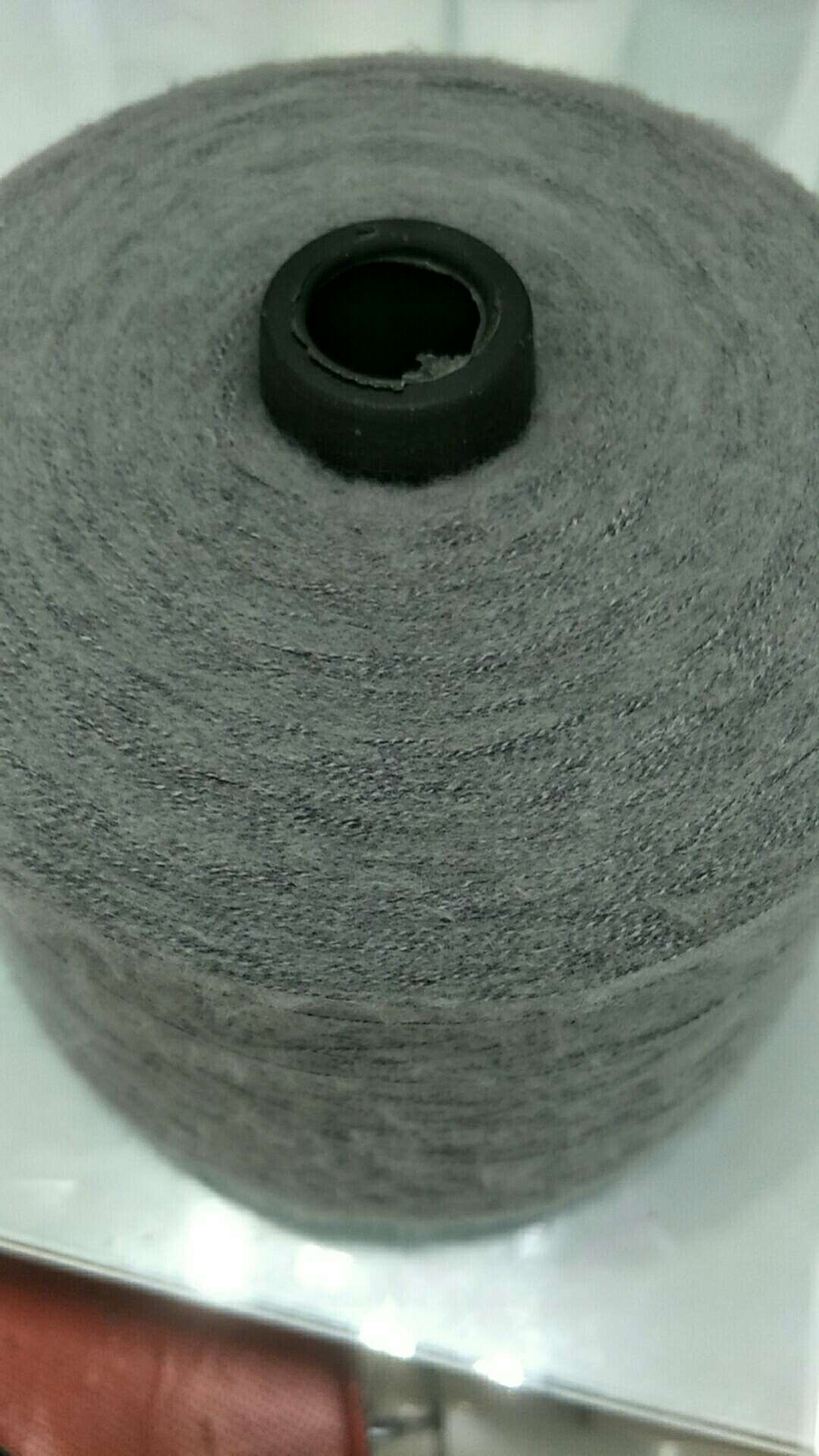 Black core brushed yarn and wool textile products