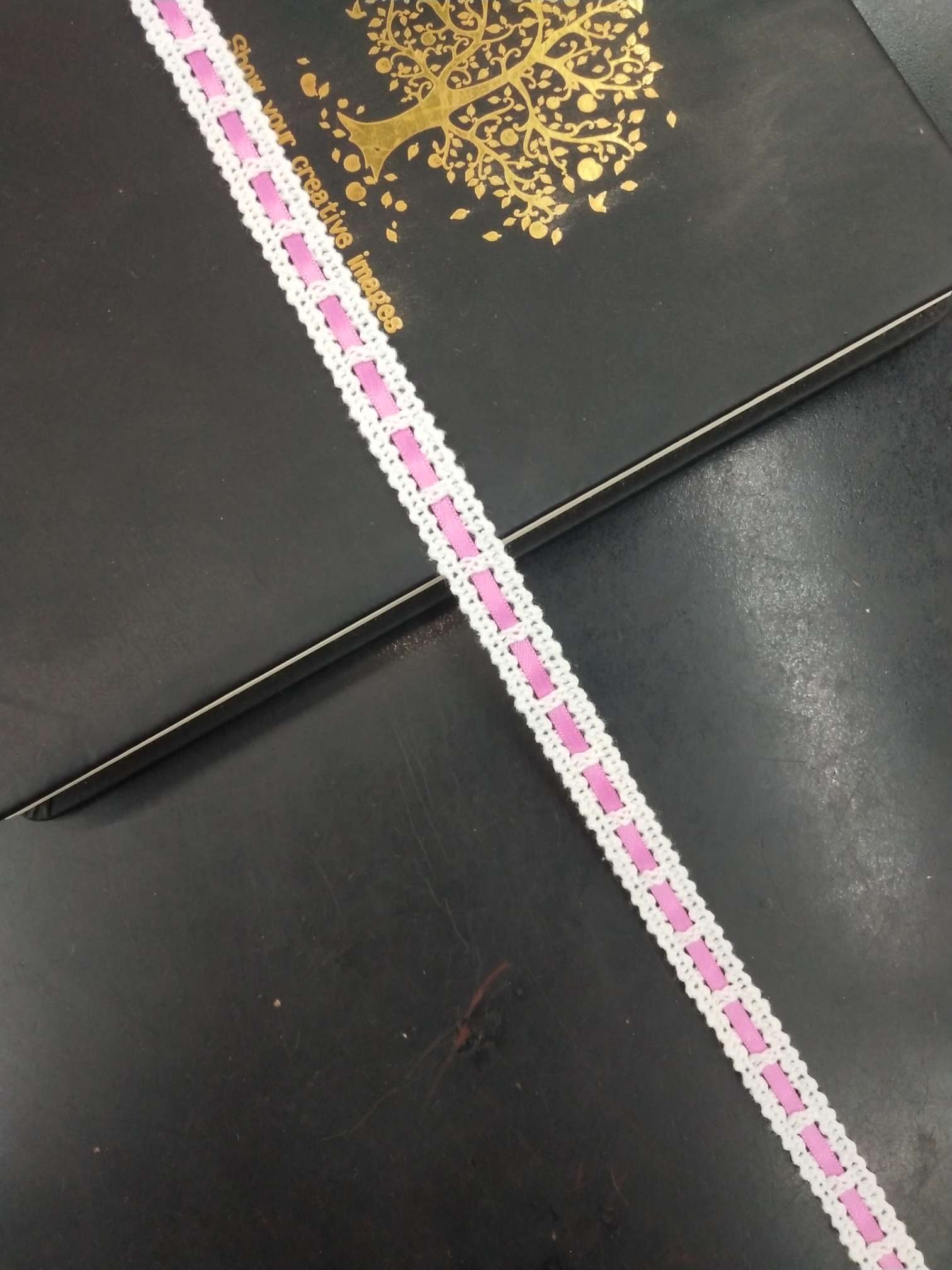 1085 strings of ribbon lace