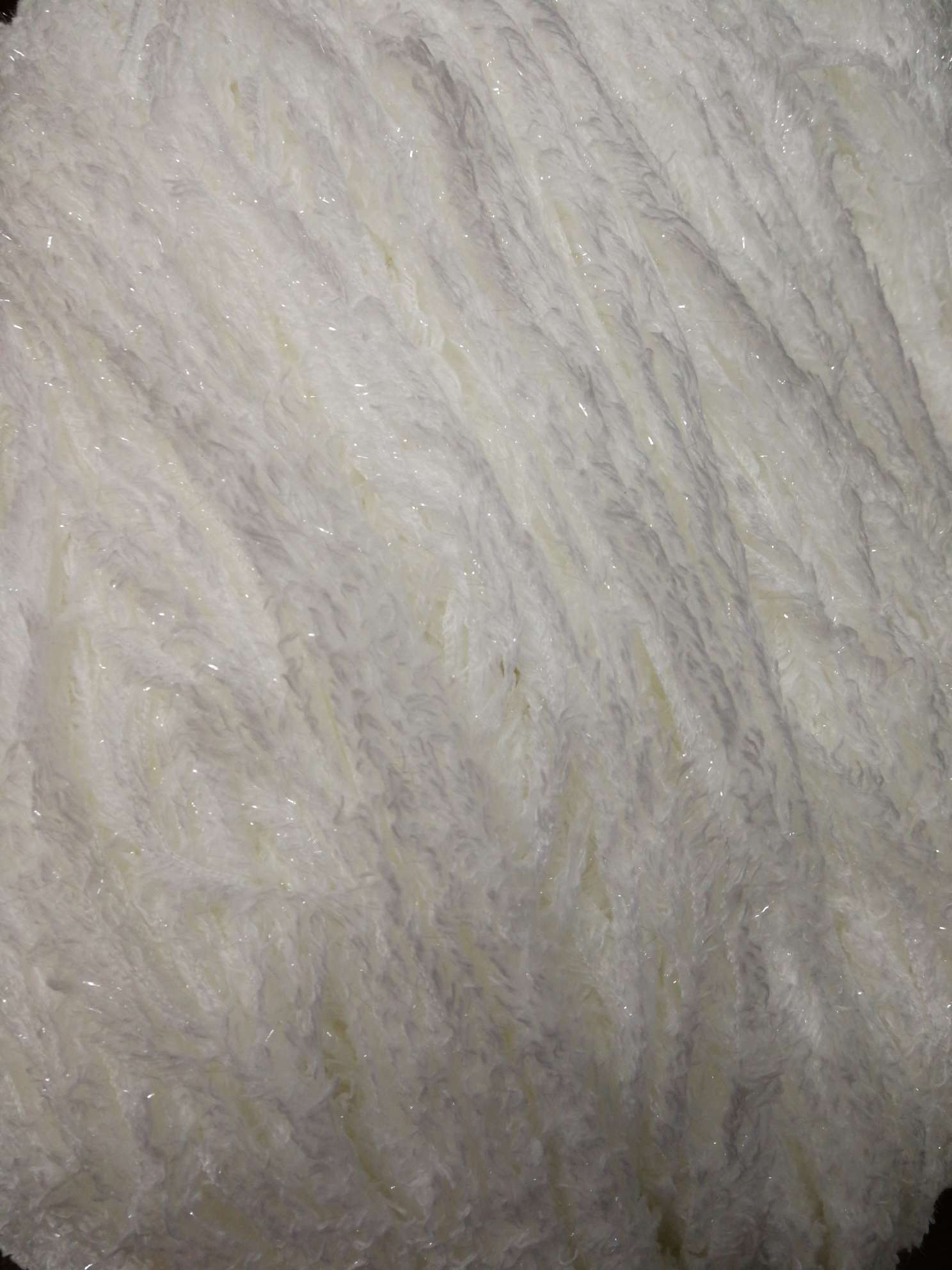 Gold-threaded twill yarn