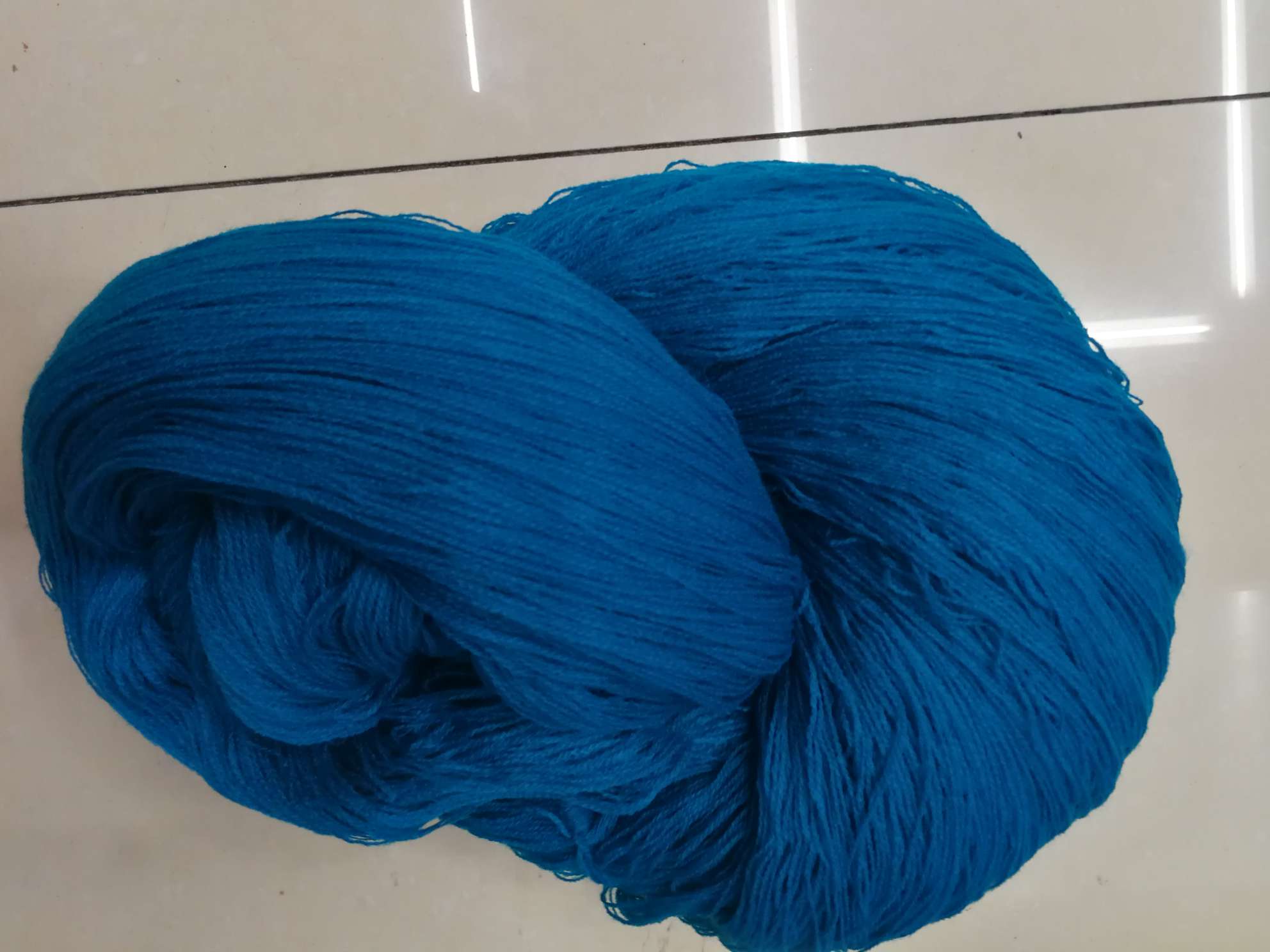 Blue perforated acrylic yarn