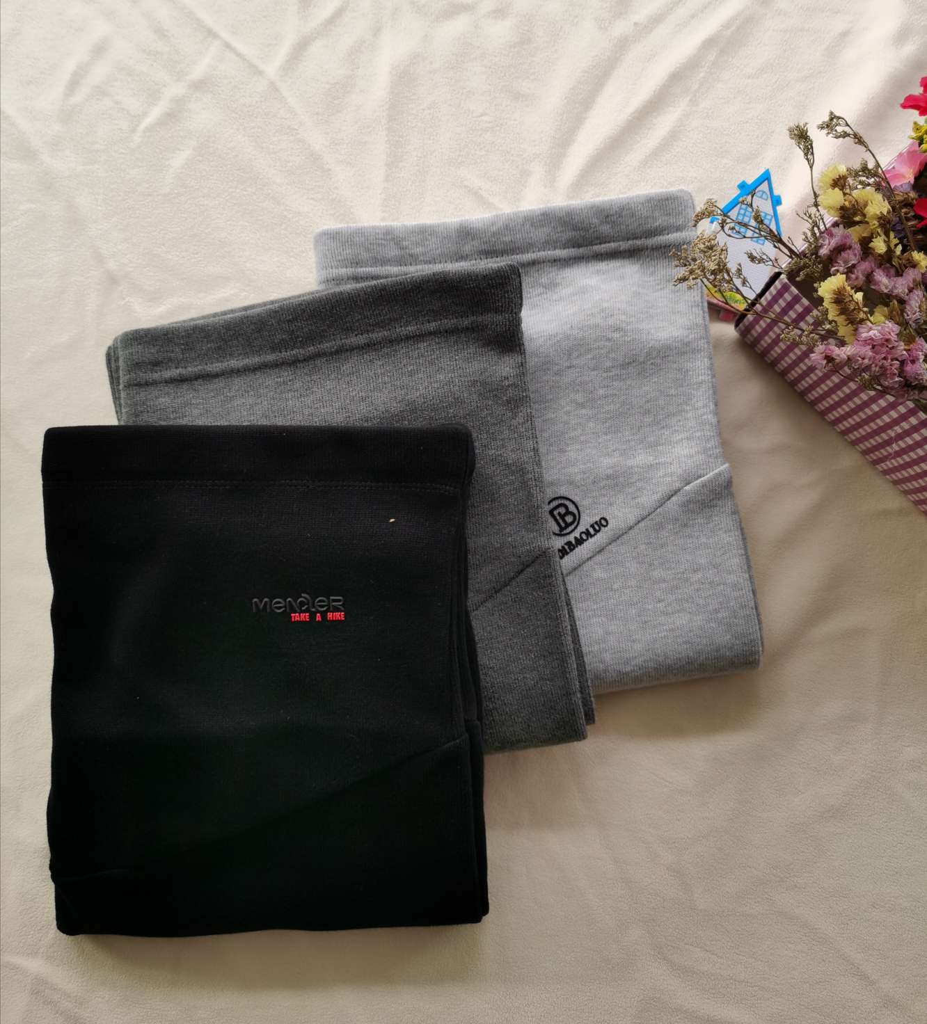 Maternity pants, with a base layer and lantern pants worn over it, trendy mom pants details Picture