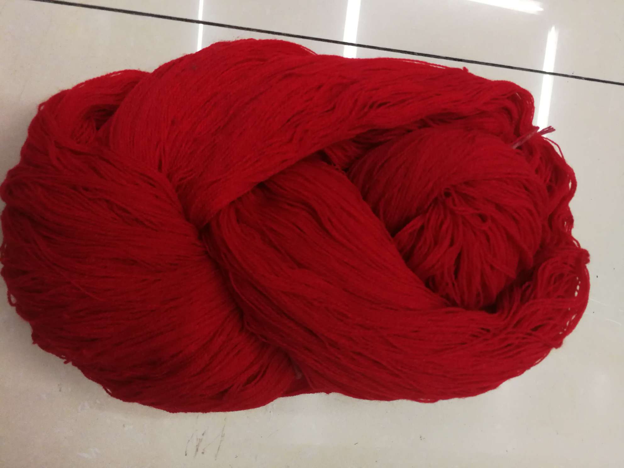 Acrylic yarn spun in bright red
