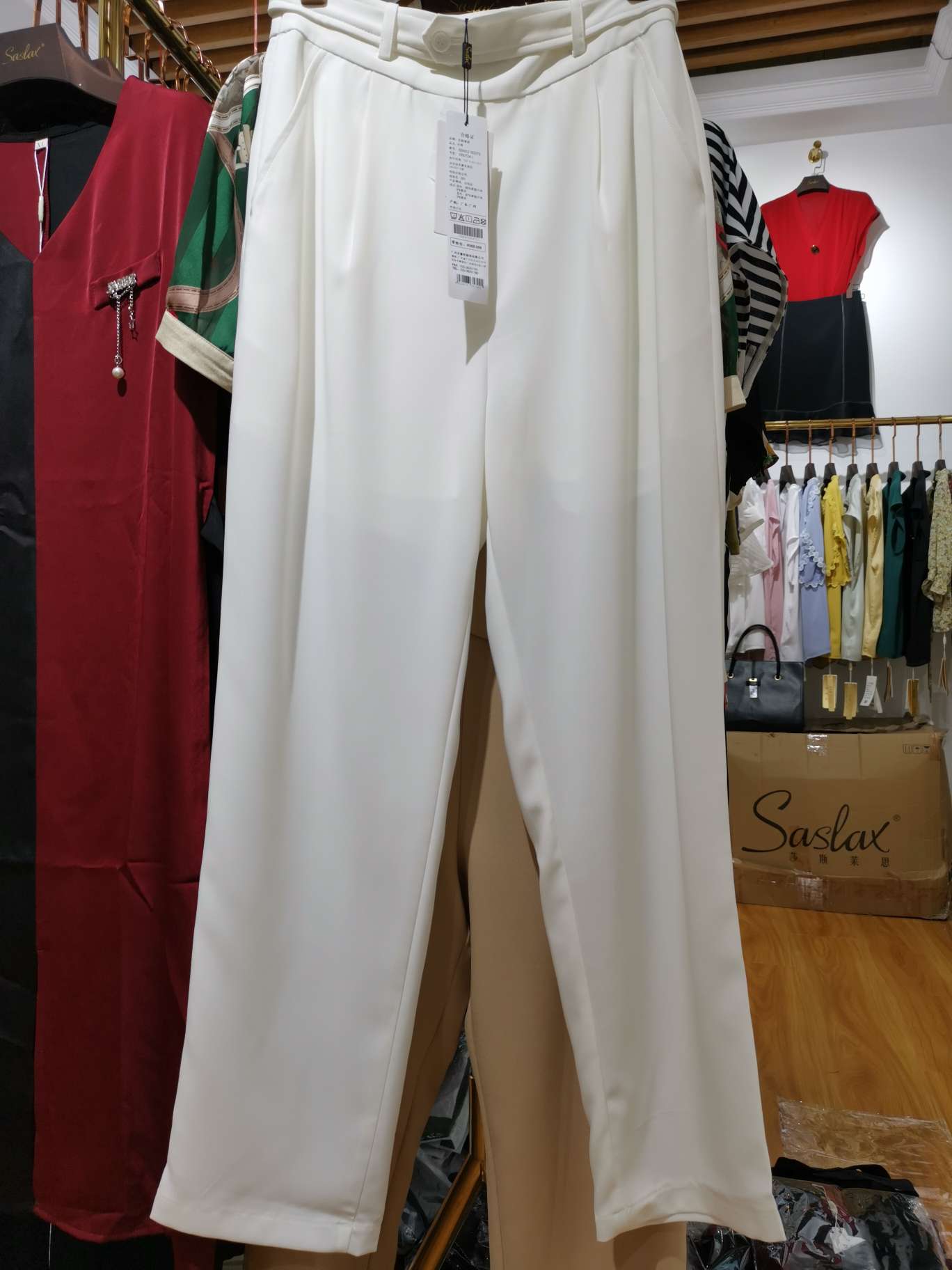 White fashionable women's trousers with pockets