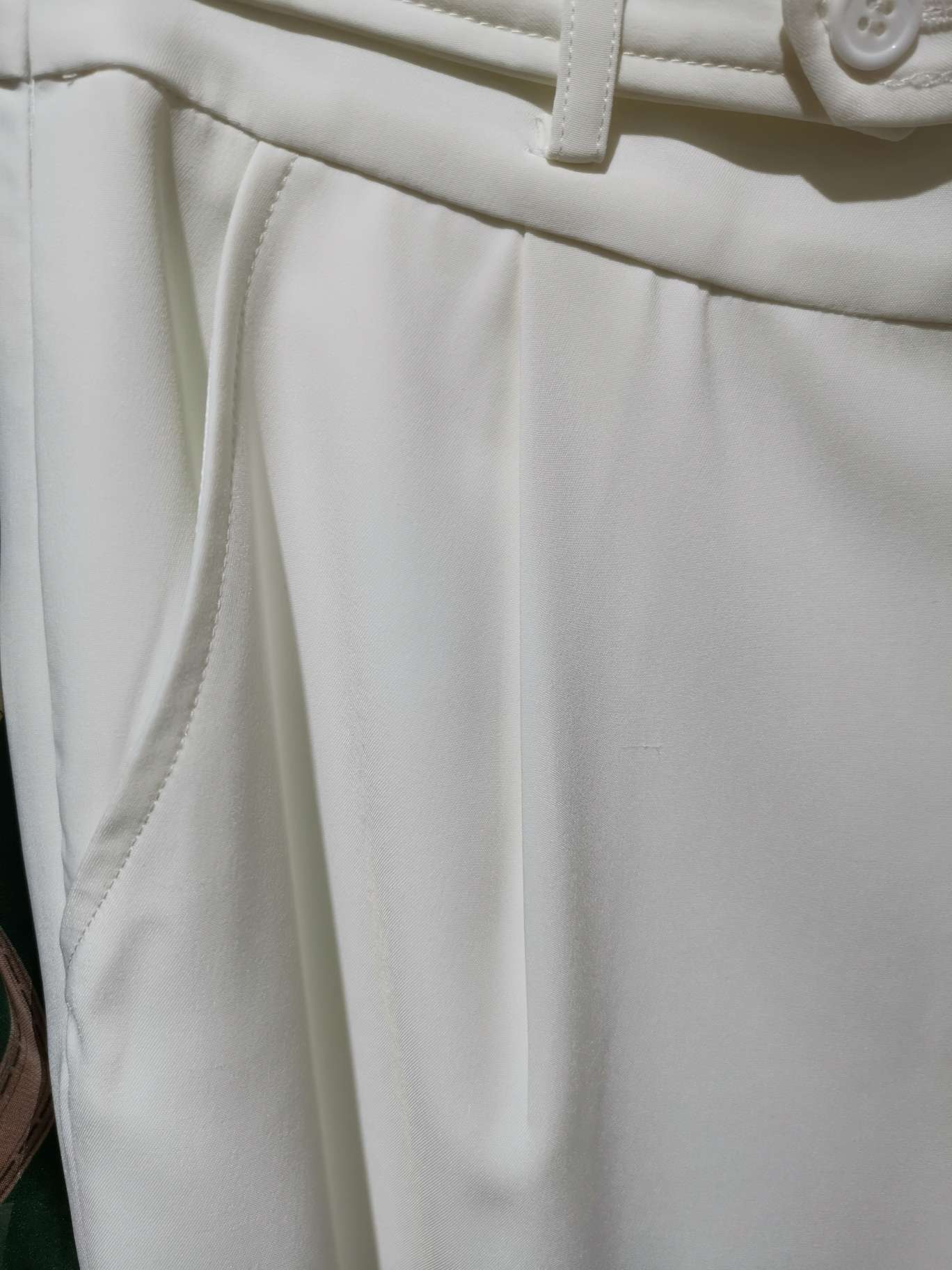 White fashionable women's trousers with pockets Specification image