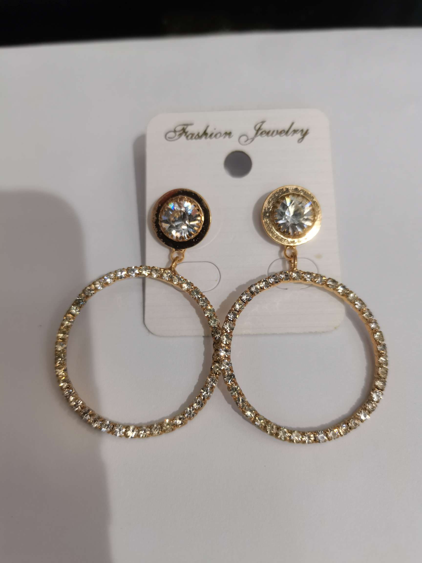 Round ten-diamond earrings