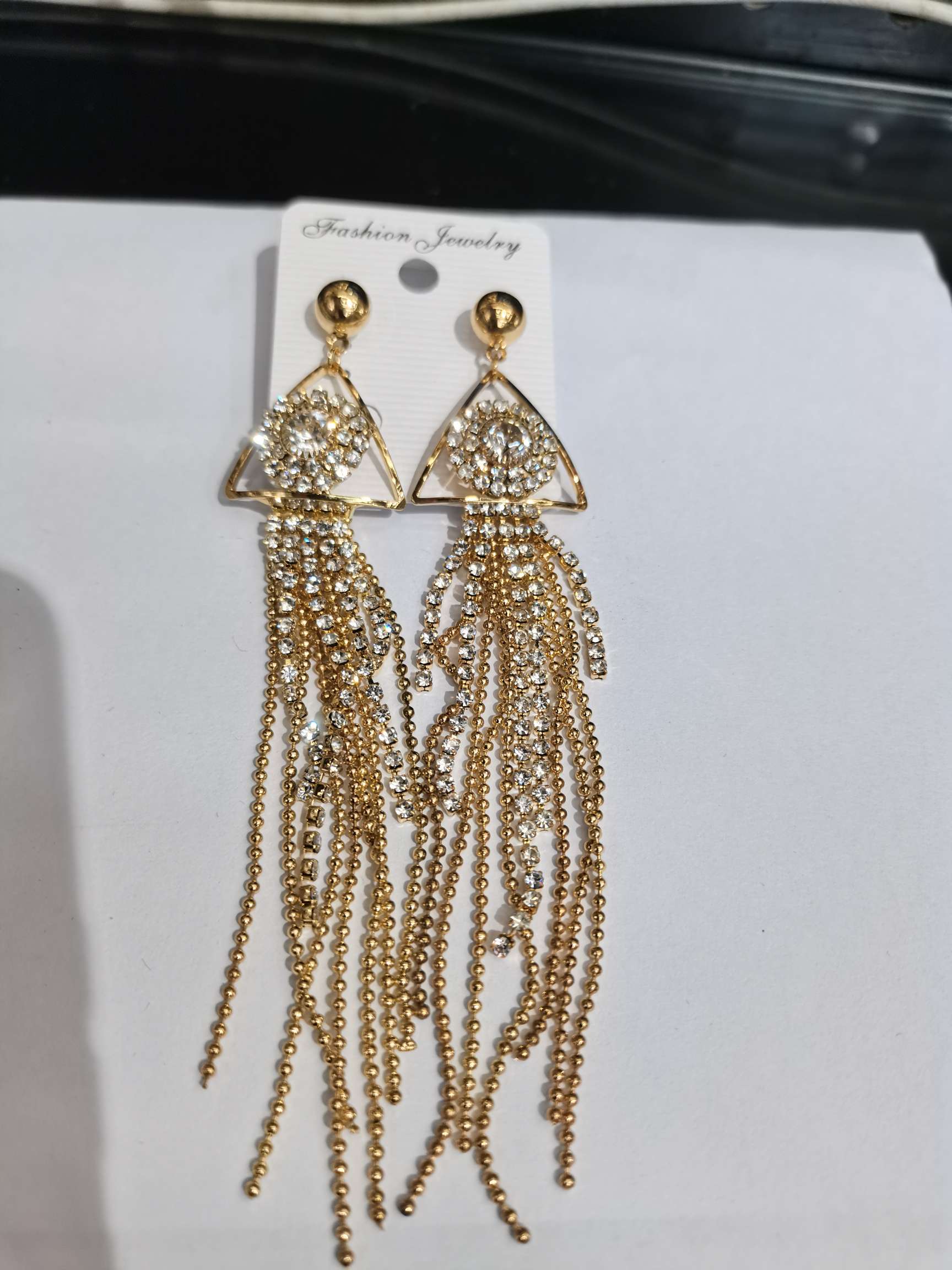 Triangular long earrings