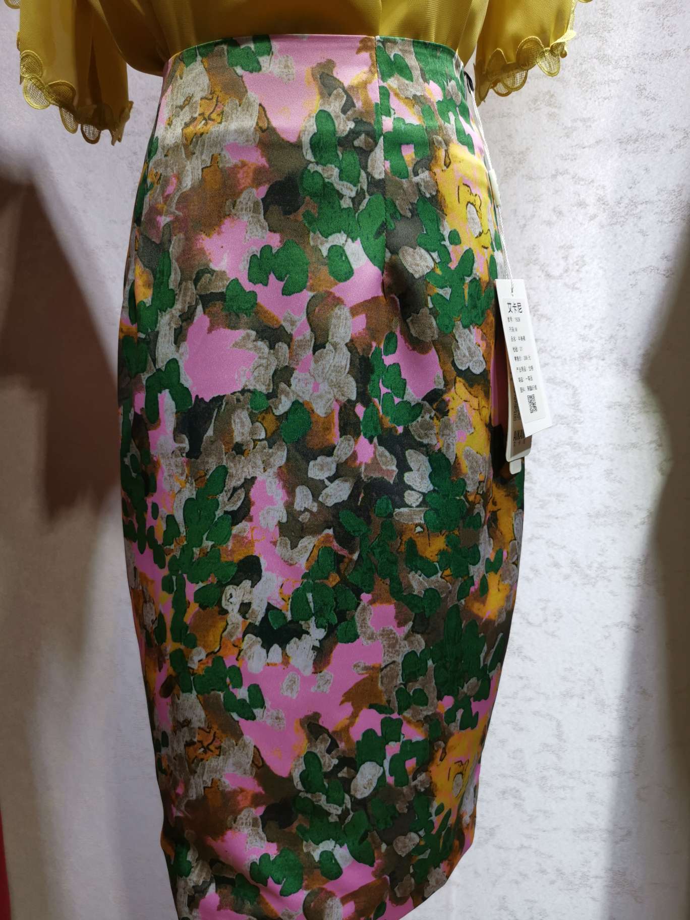 A half-length women's dress with bright flowers