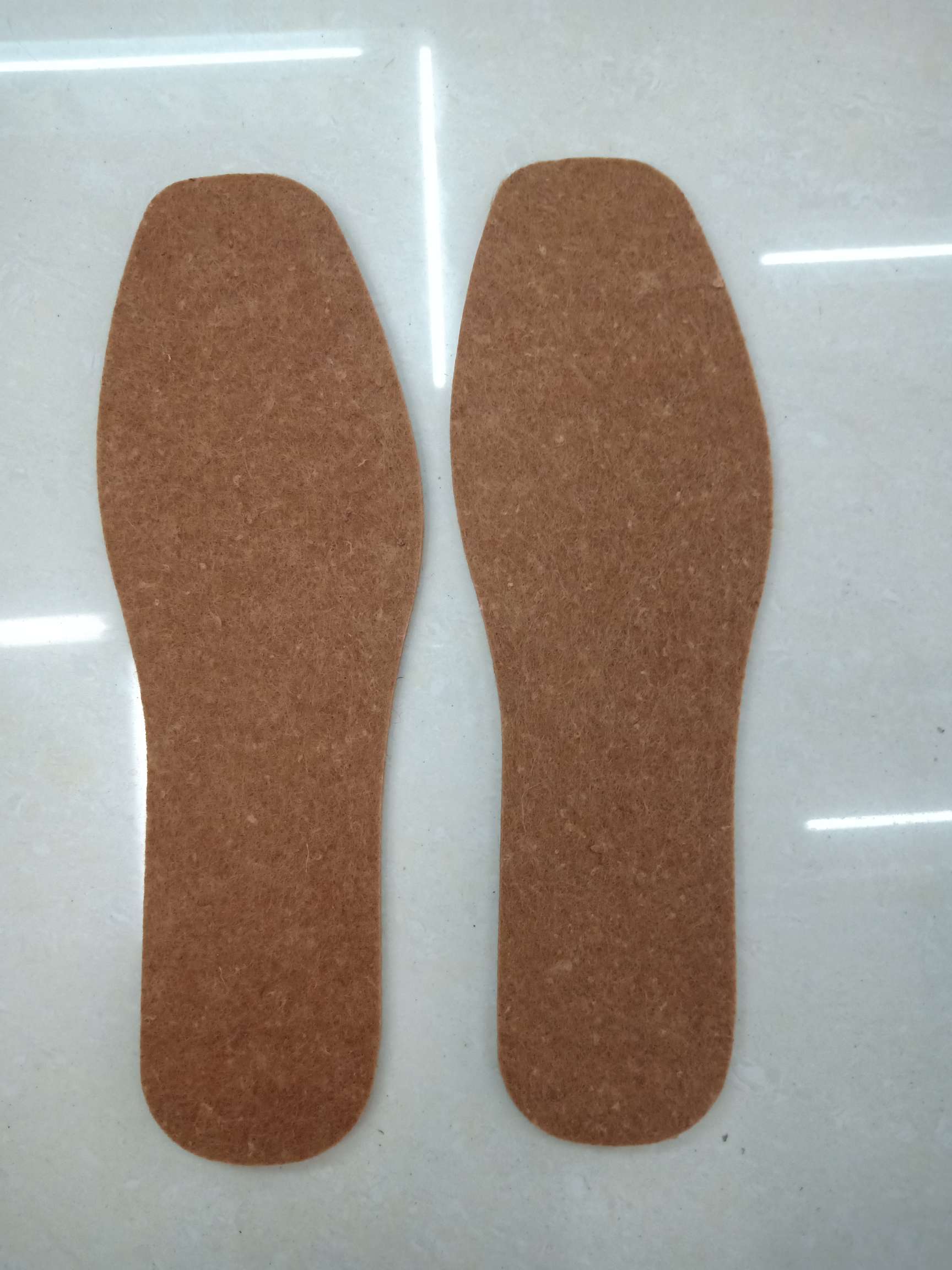 Cotton felt insoles for warmth