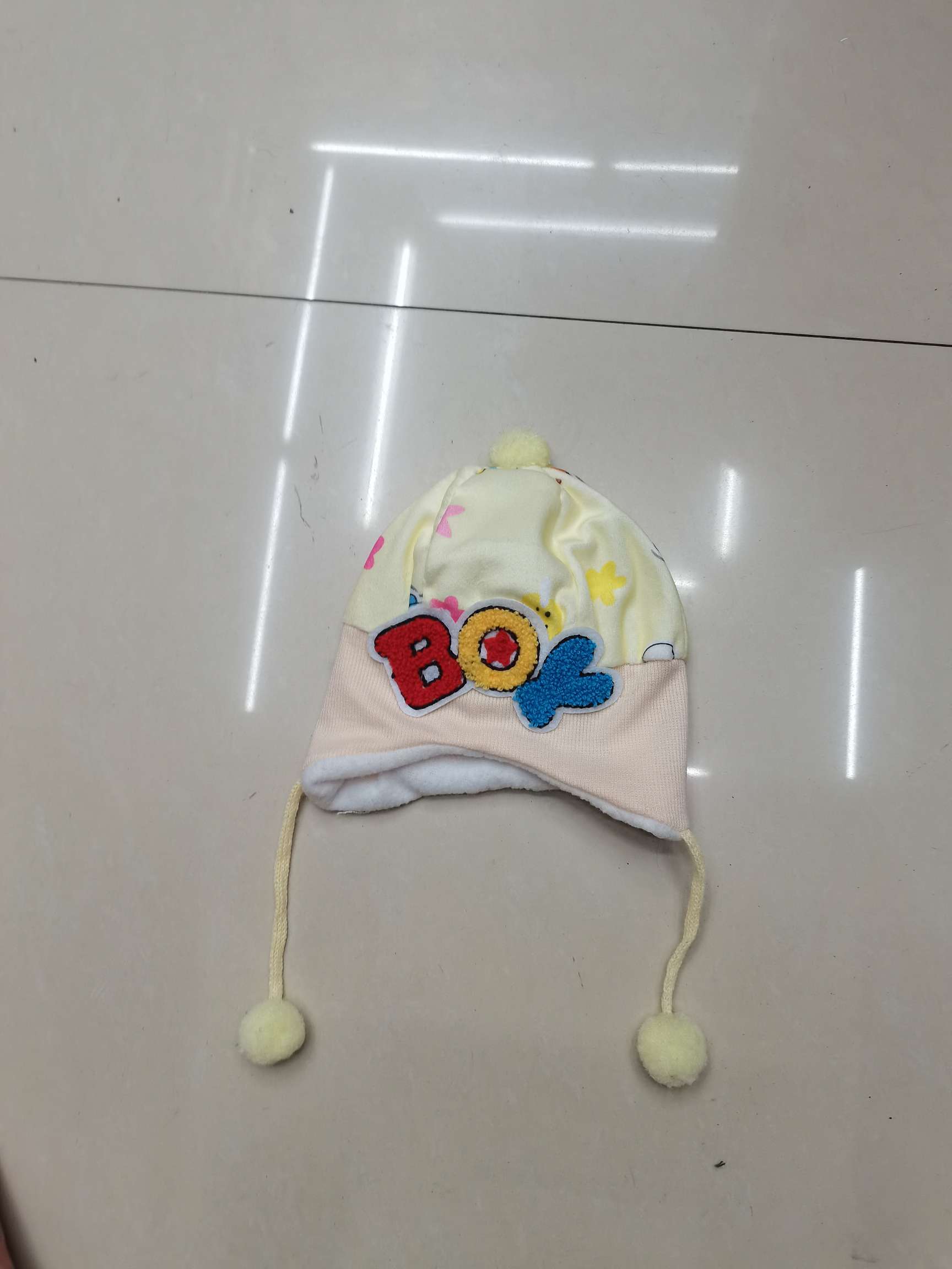 Boy with a ball cap