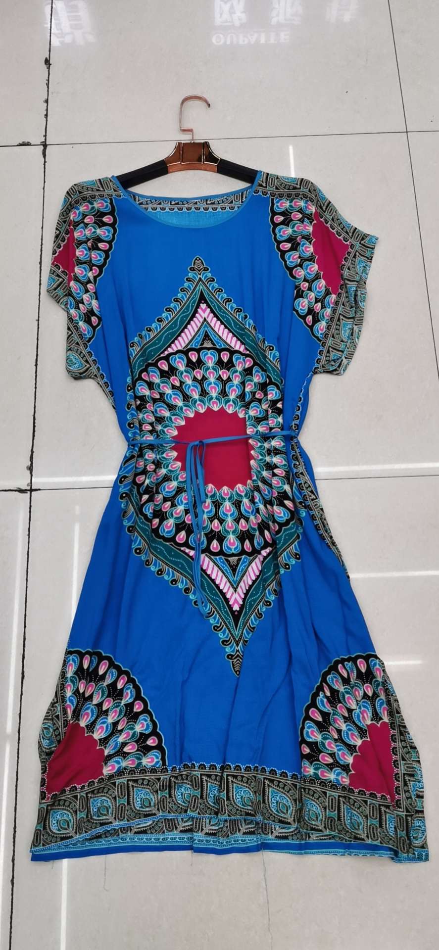 The lady's small robe dress is loose and casual