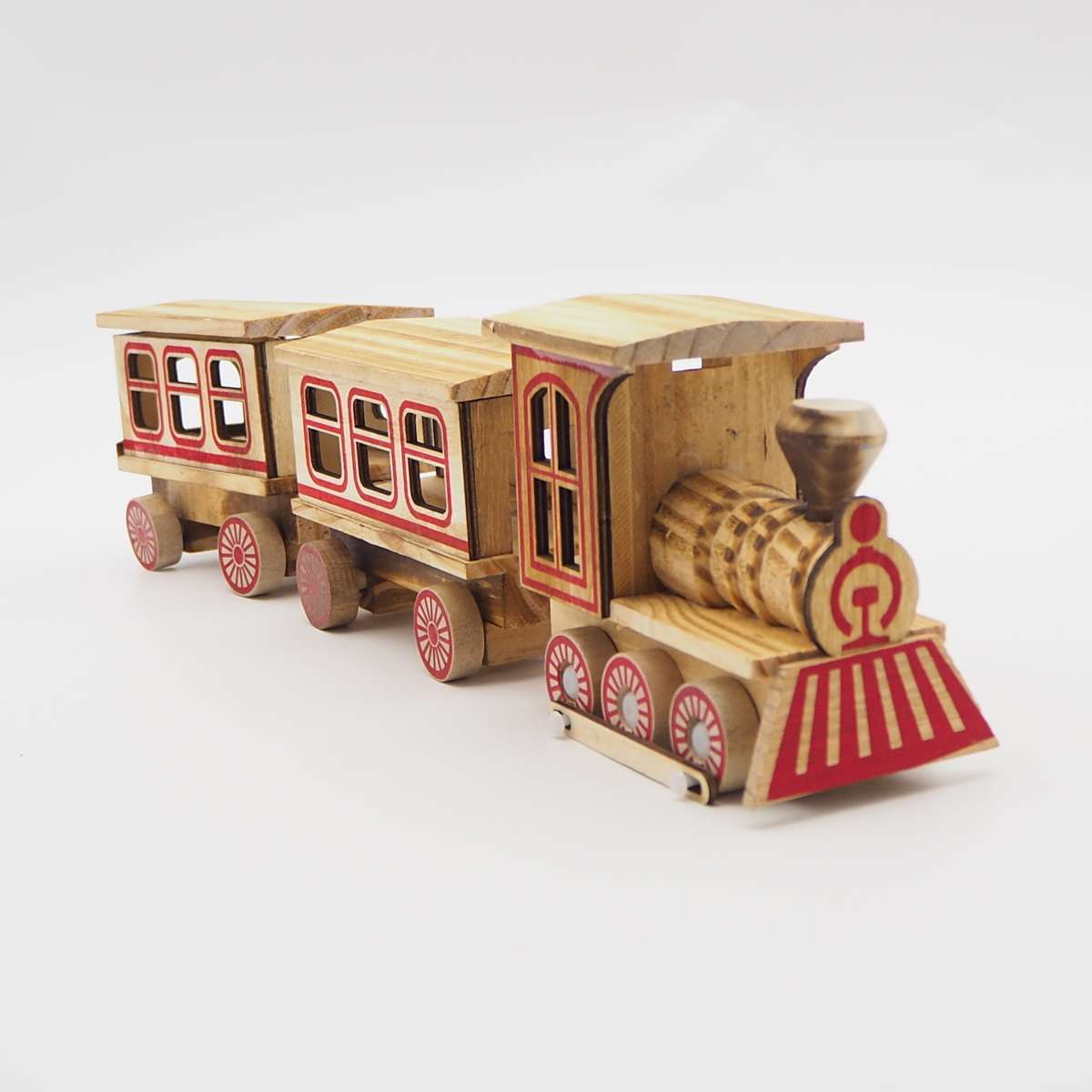 A three-carriage wooden craft toy train
