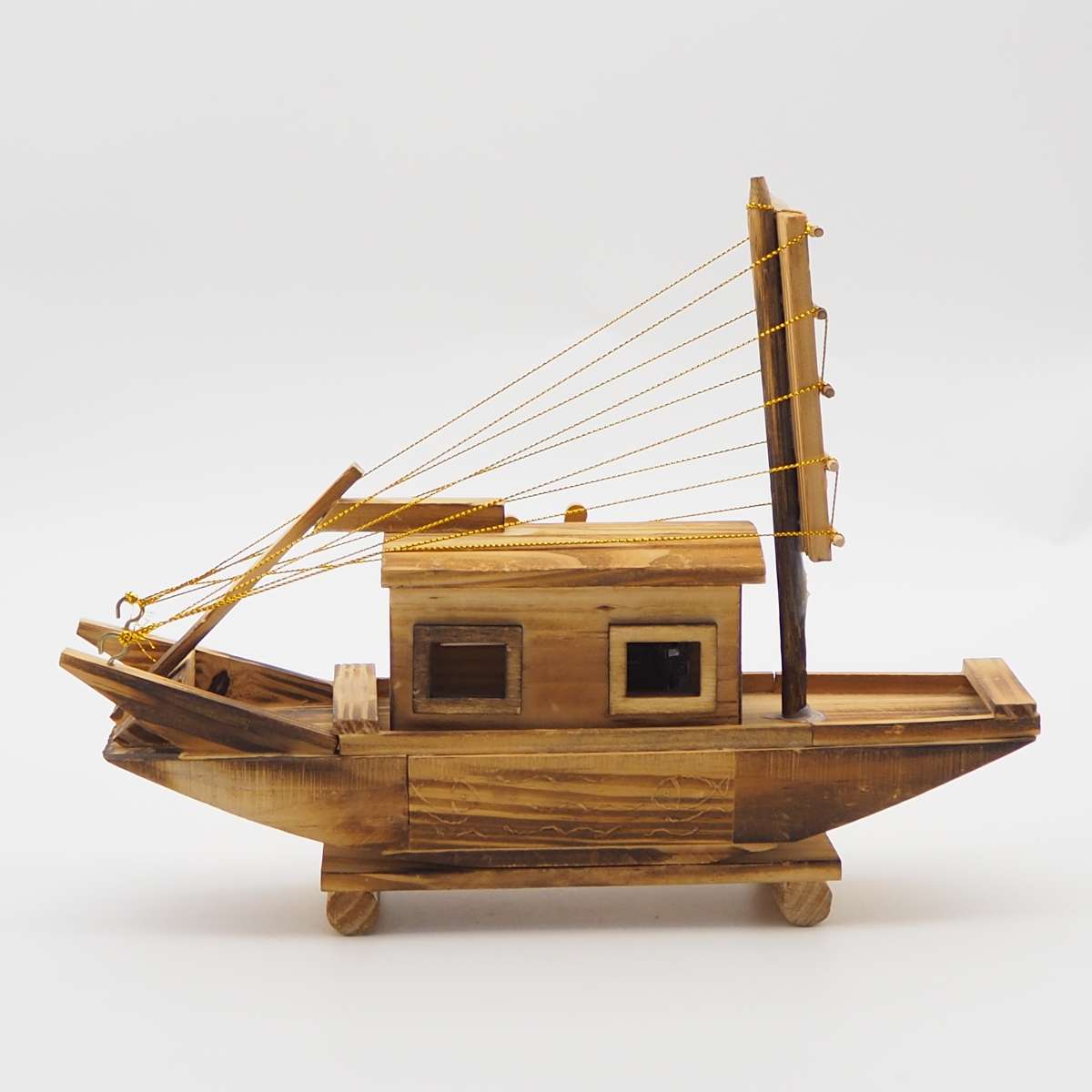 A wooden craft toy, a smooth sailing boat details Picture