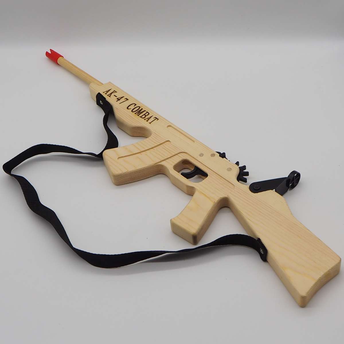 Factory direct sales of long rubber band charge white wood gun with rubber ring, imitation wood gun AK children's 47 toy