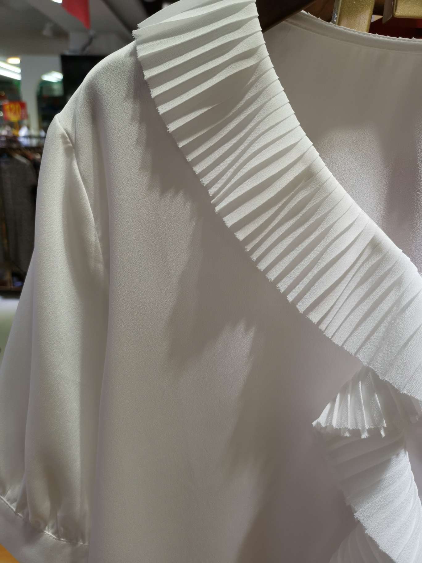 A fashionable women's top with a large lace V-neck Application Scenario