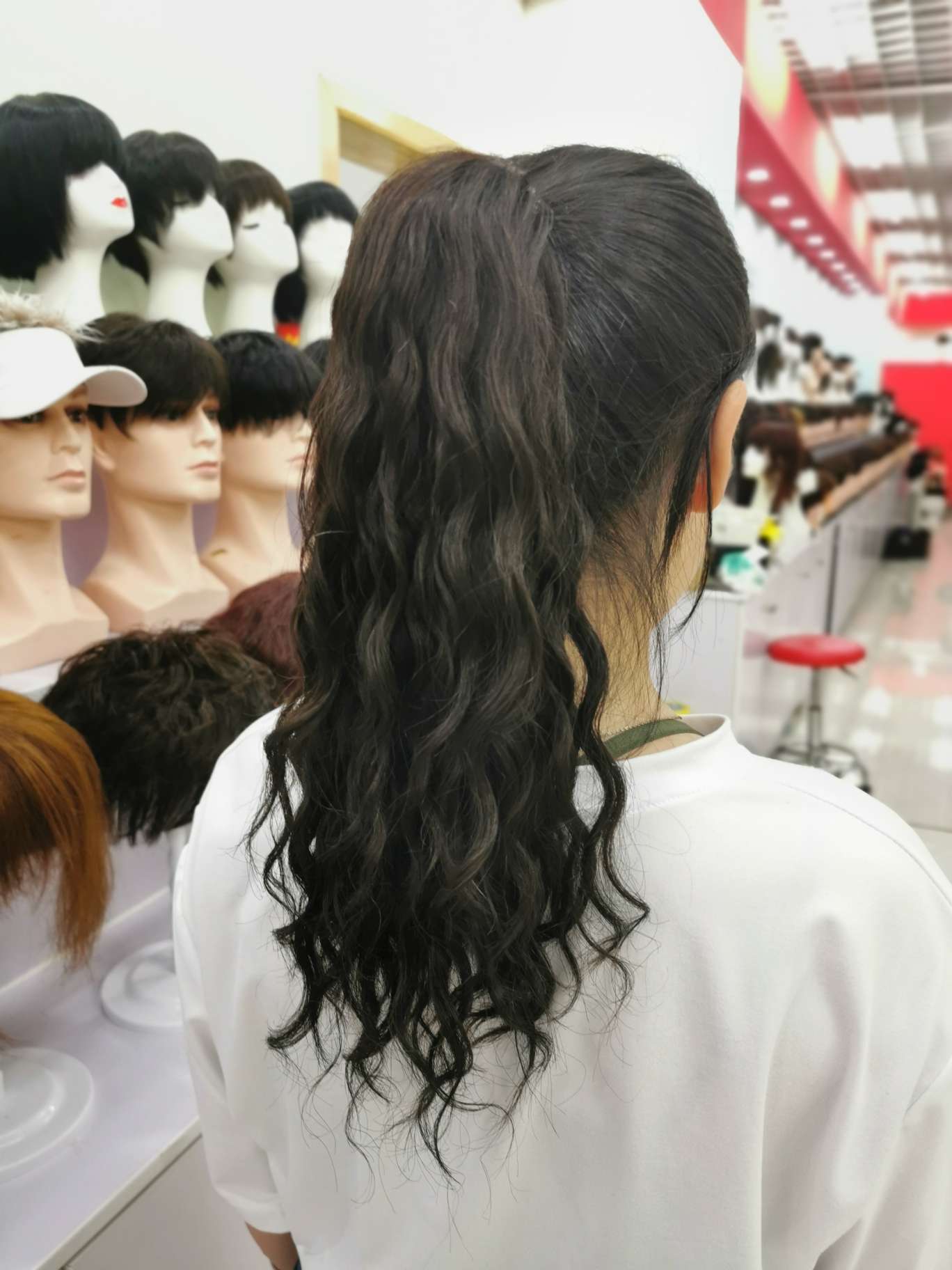 100% real hair, human hair clipped in a ponytail, curly style Item Picture