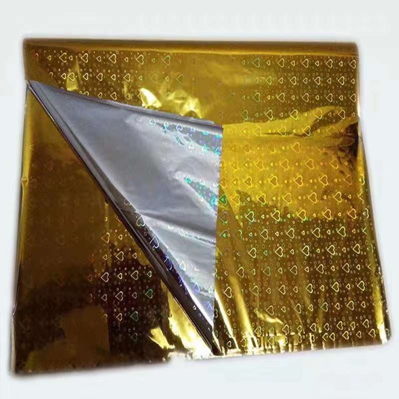 厂家直销镭射纸，礼品包装纸，塑料纸。产品图