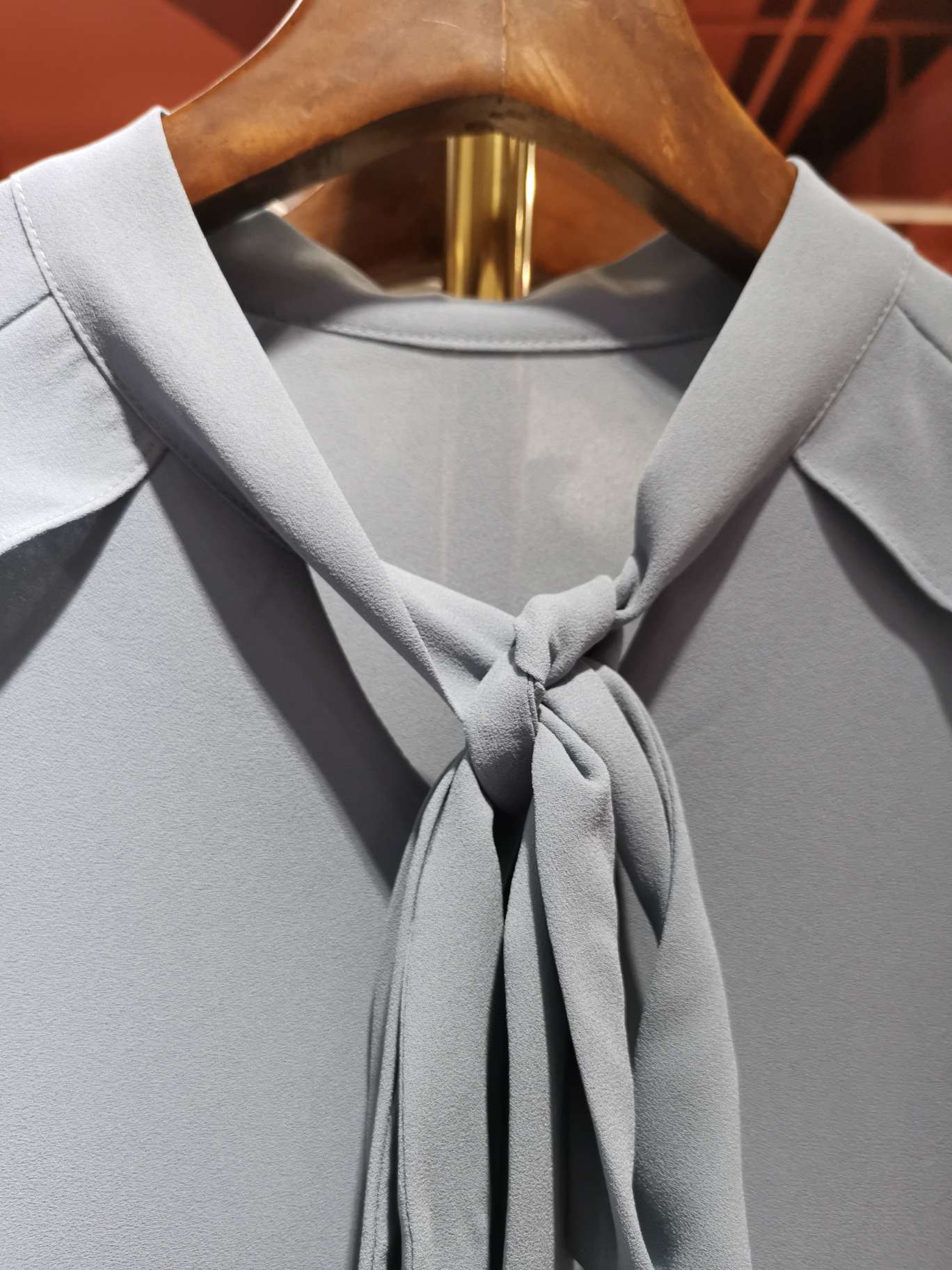 Fashionable deep V-shaped long-sleeved women's top
