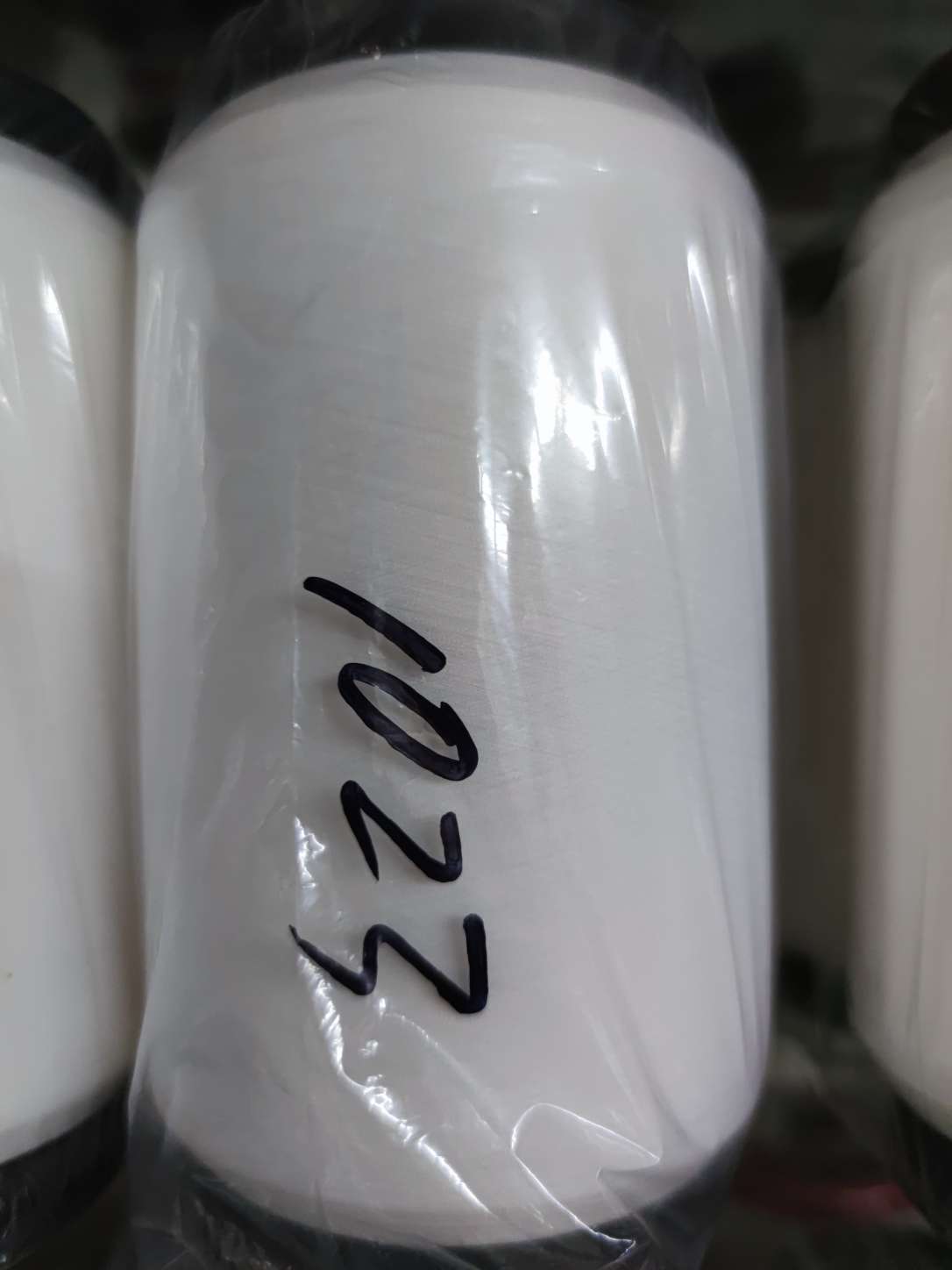 Wholesale factory direct sales of air-covered yarn white spandex polyester covered filament chemical fiber thread 1023