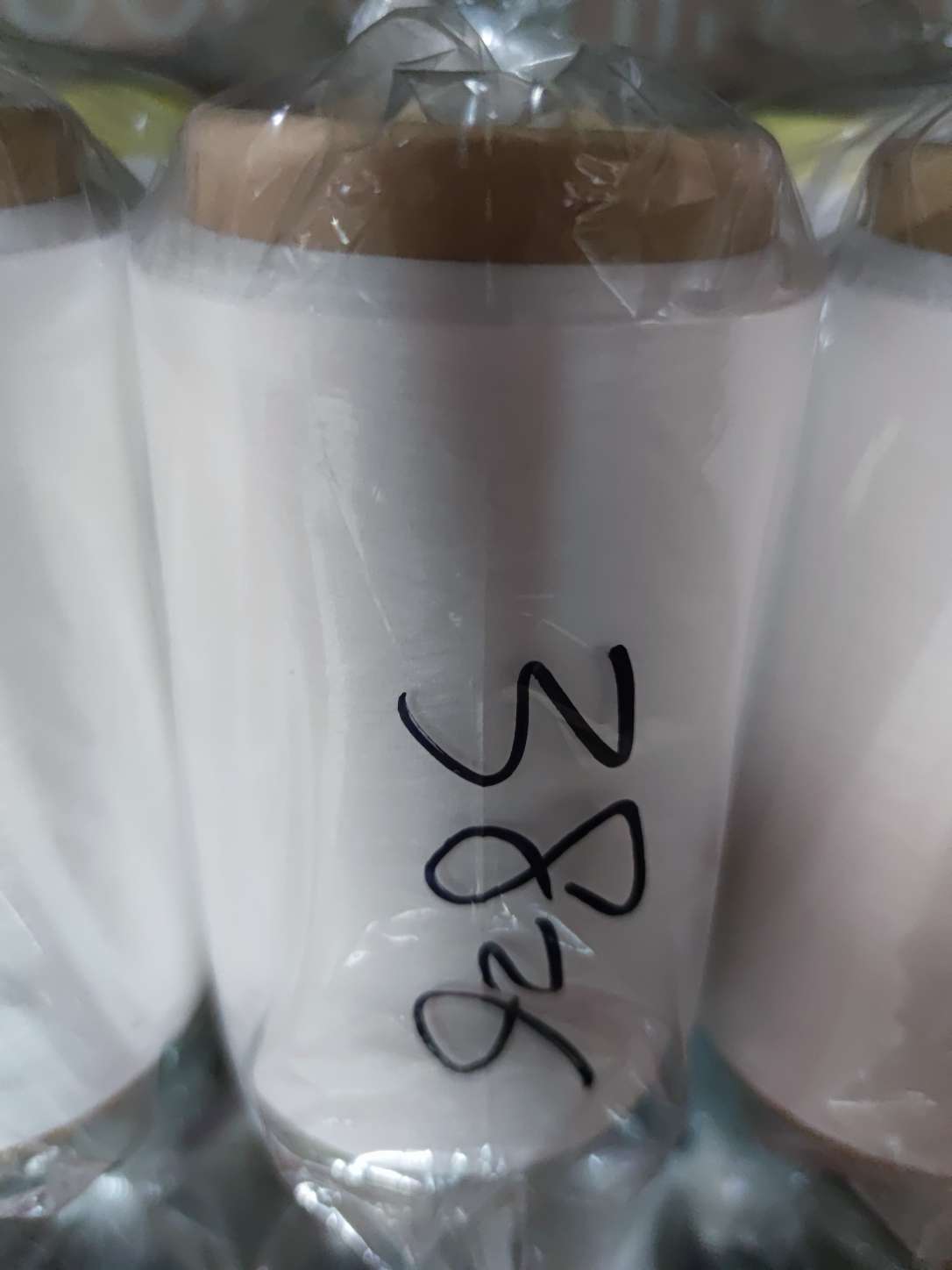 Wholesale factory direct sales of air-covered yarn white spandex polyester covered filament chemical fiber thread 3826 Wholesale factory direct sales of air-covered yarn white spandex polyester covered filament chemical fiber thread 3826