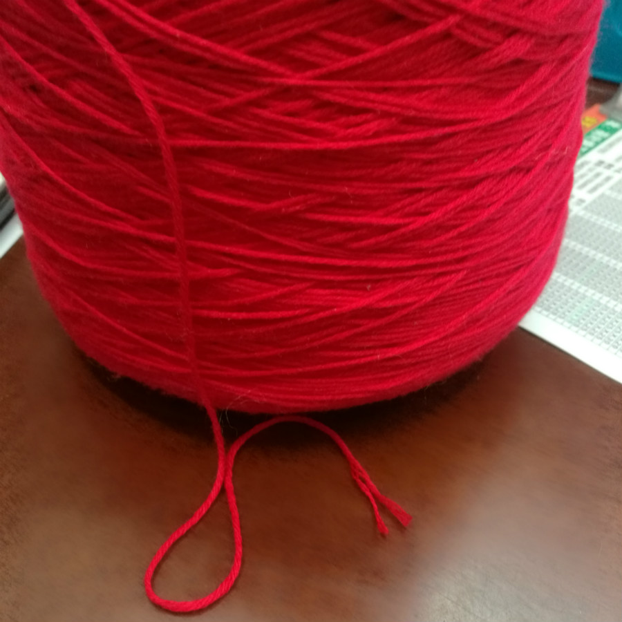 The silk protein yarn is red