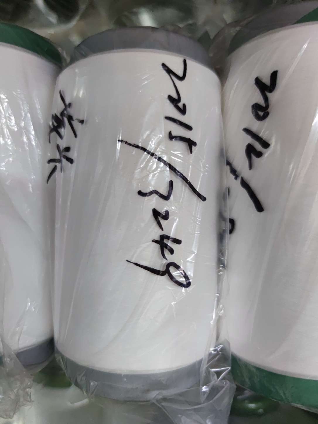 Wholesale factory direct sales of air-covered yarn white spandex polyester covered filament chemical fiber thread 2015 Wholesale factory direct sales of air-covered yarn white spandex polyester covered filament chemical fiber thread 2015