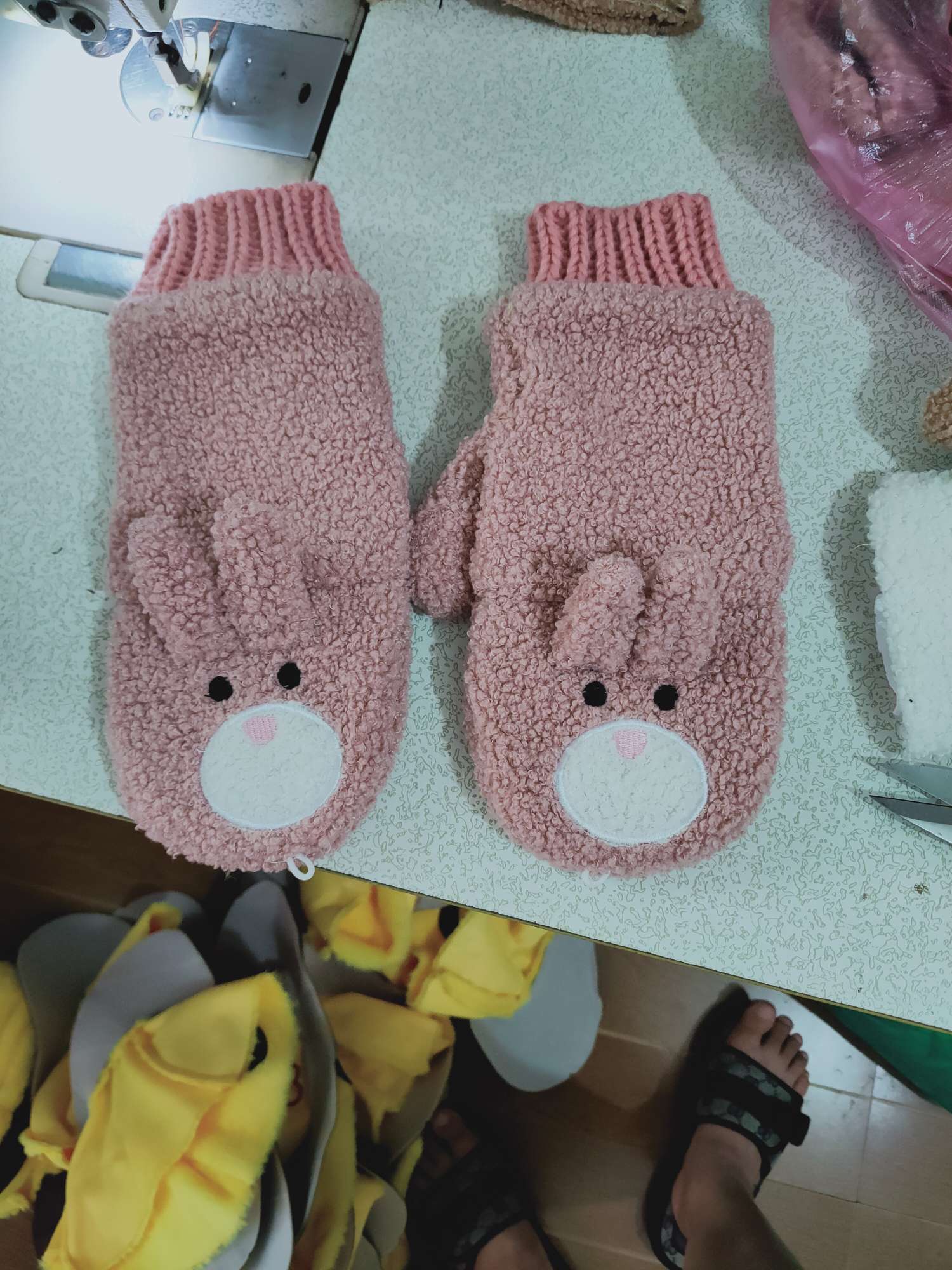 A woman with plush gloves in winter Application Scenario