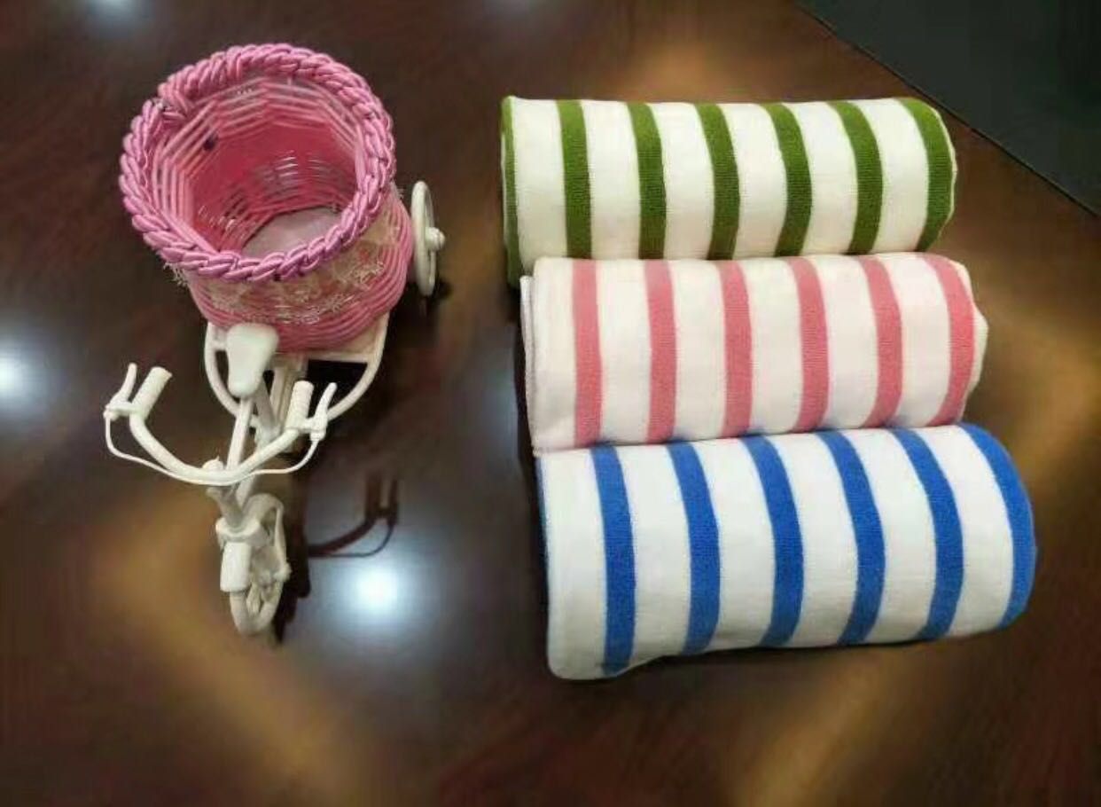 The brushed colored striped bath towel is super absorbent and extremely soft
