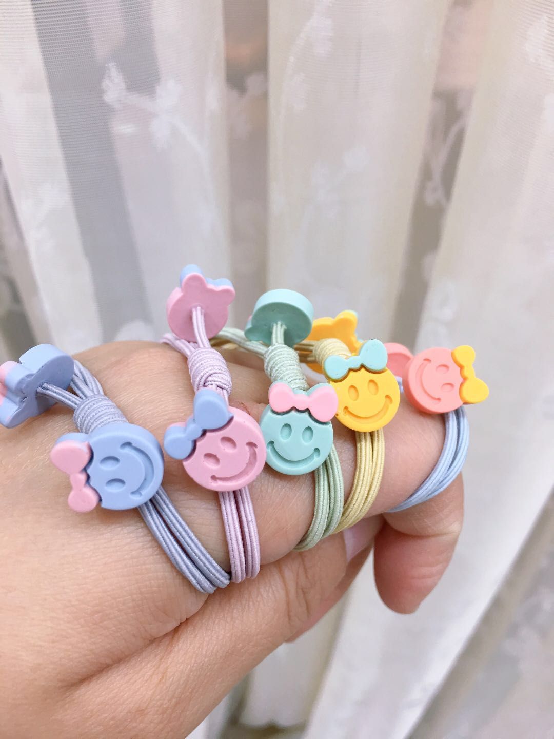 皮筋粘两头领结笑脸皮筋