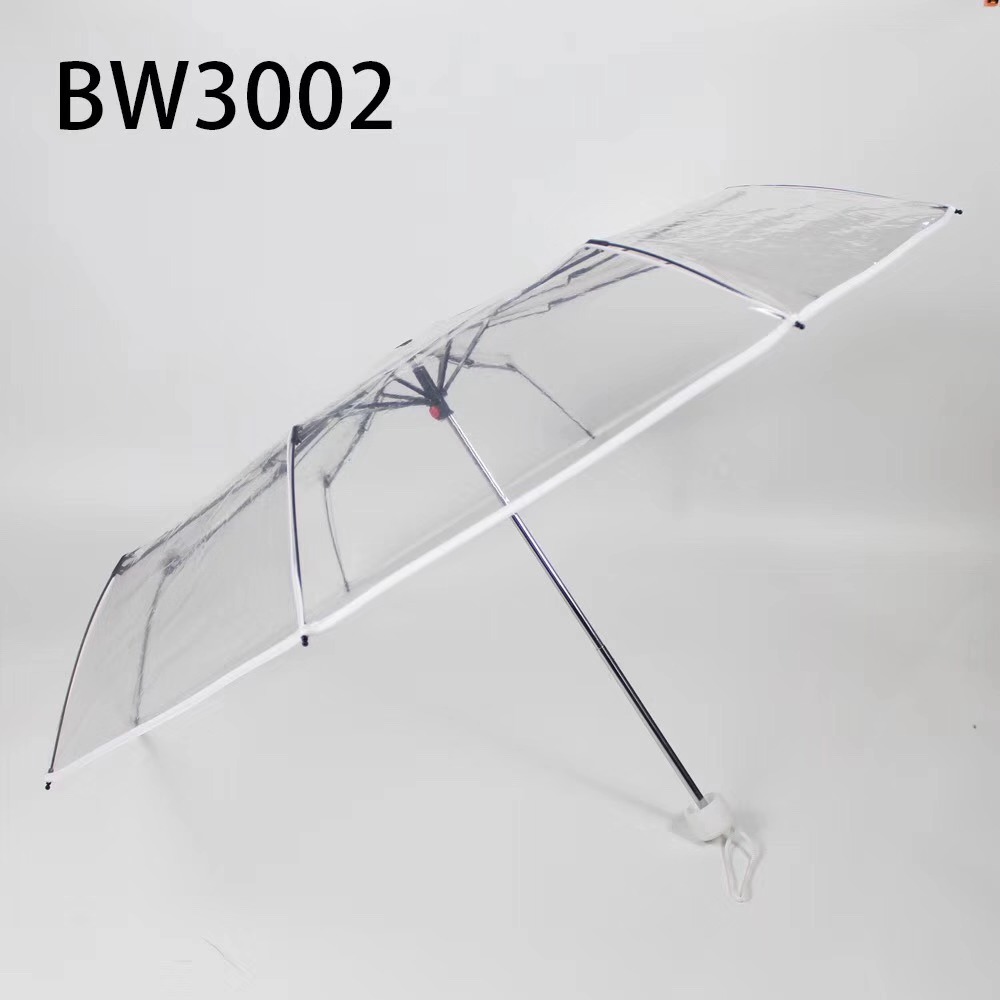 The transparent three-fold umbrella has black and white borders details Picture